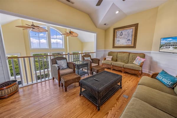 First Floor Living Room at The Hemingway — Comfortable Gathering Space | Part of 28BR Estate, Outer Banks