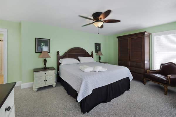 Bedroom 7 at The Hemingway — Bright King Suite with Ocean-Inspired Décor | 28BR Estate, Outer Banks