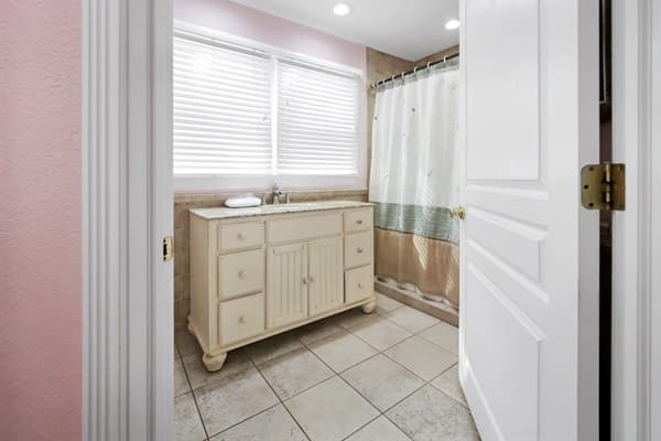 Bathroom at The Hemingway — Clean & Bright with Modern Fixtures | Fitzgerald & Hemingway, Outer Banks