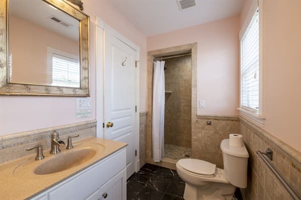Bathroom at The Hemingway — Well-Appointed with Quality Fixtures | 28BR Estate, Corolla, Outer Banks