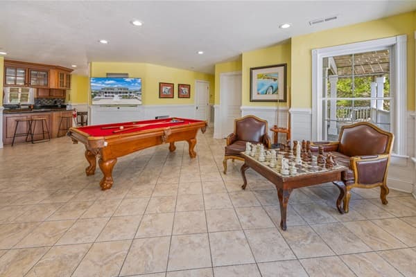 Game Room at The Hemingway — Wet Bar, Pool Table & Lounge Area | Fitzgerald & Hemingway, Outer Banks