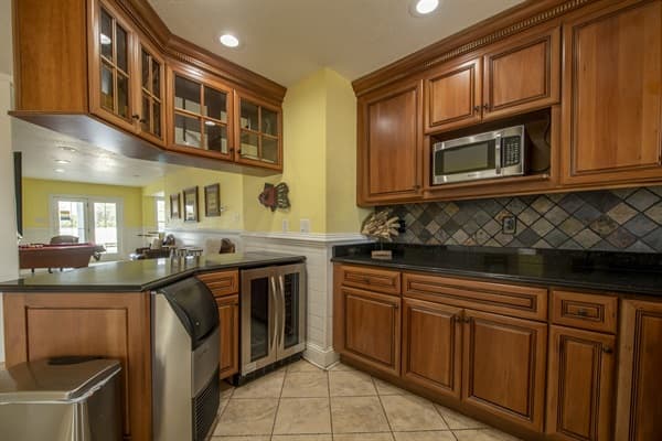 The Hemingway Game Room with Wet Bar — Cocktails & Entertainment for Evening Fun | 28BR Estate, Outer Banks