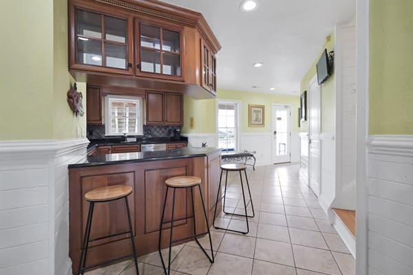 Entertainment Area at The Hemingway — Comfortable Seating & Games | Part of 28BR Estate, Outer Banks