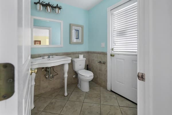 Hemingway Full Bathroom — Modern Finishes with Walk-In Shower, One of 30 Bathrooms at This Outer Banks Luxury Oceanfront Beach House