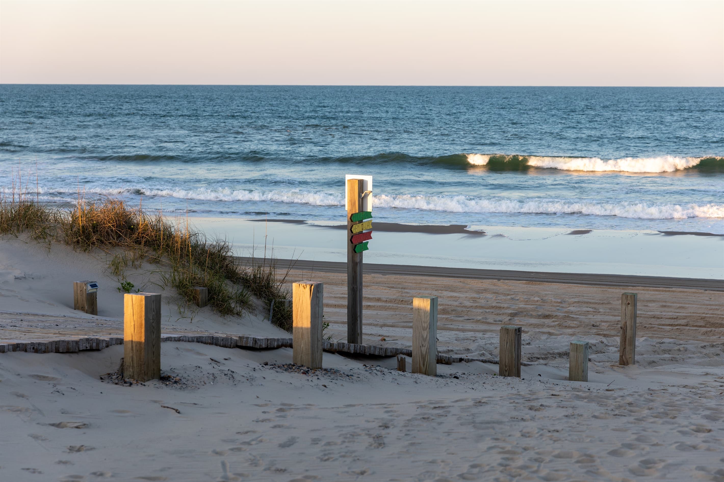 Resort-style pool from an additional perspective — private aquatic retreat surrounded by natural Outer Banks sand dunes