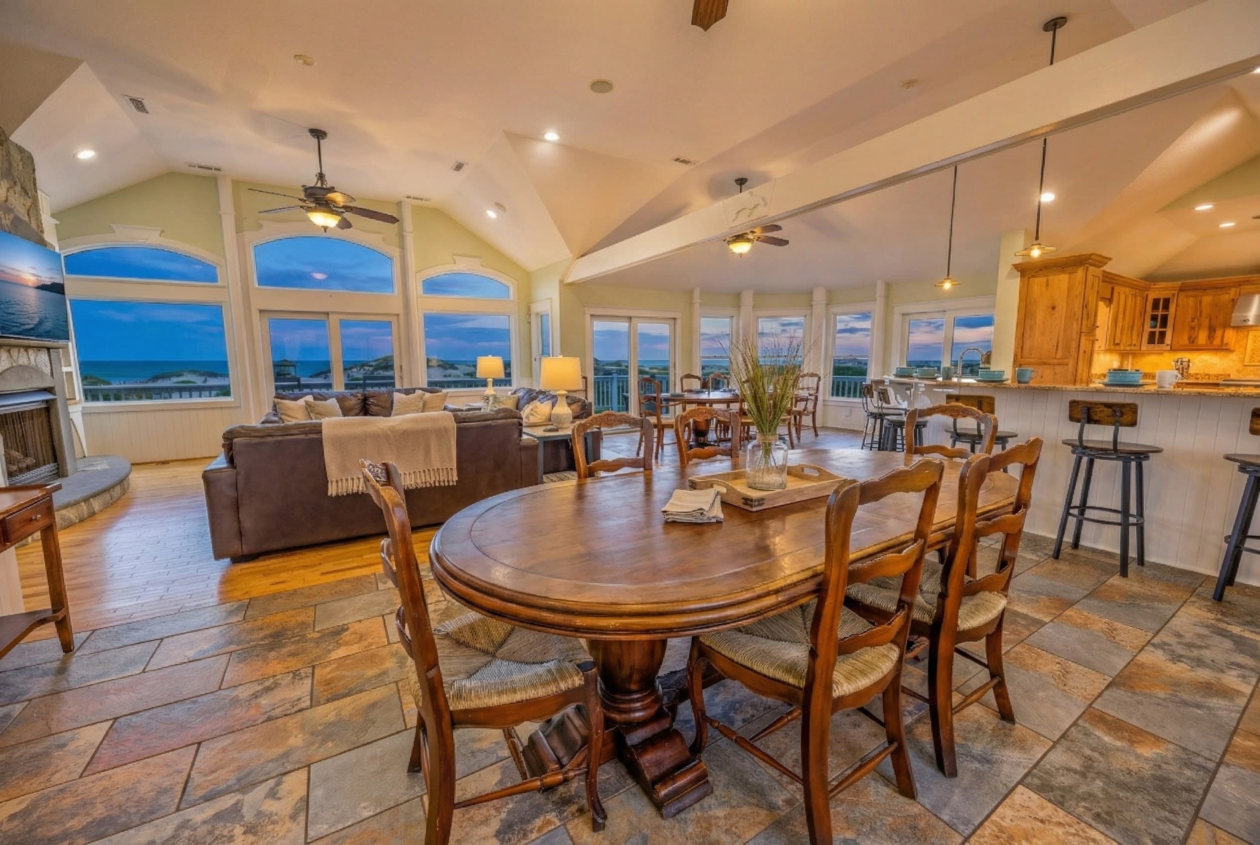 Formal dining space for distinguished gatherings — elegant table settings and coastal atmosphere for memorable shared meals