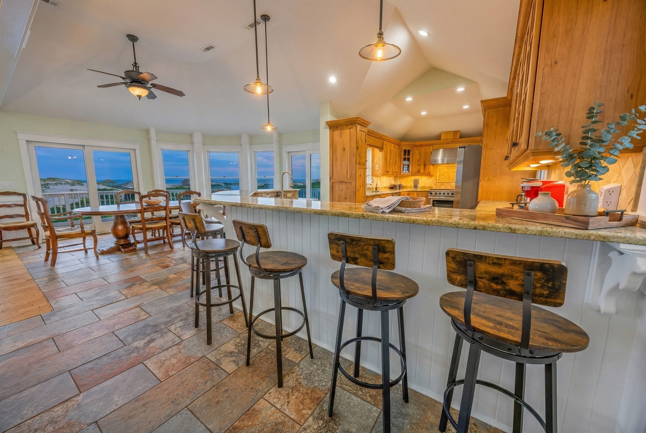 Gourmet kitchen with premium cabinetry — fully equipped for preparing elegant meals from casual breakfasts to formal dinners