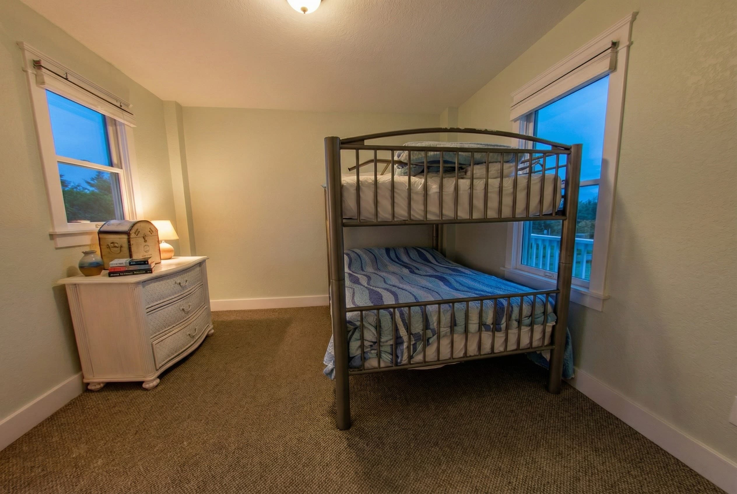 Oceanview king bedroom — wake to Atlantic panoramas through expansive windows where natural light meets luxurious comfort