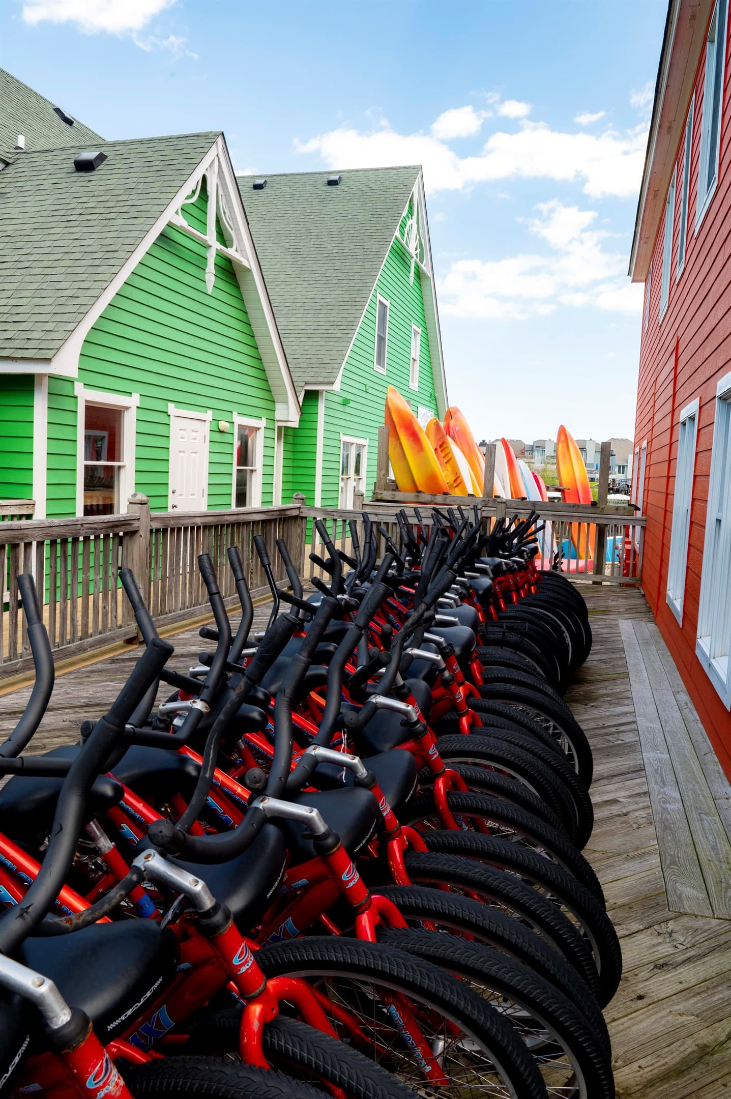 Quaint beach cottages with kayak access — water sports and coastal charm define the Outer Banks lifestyle