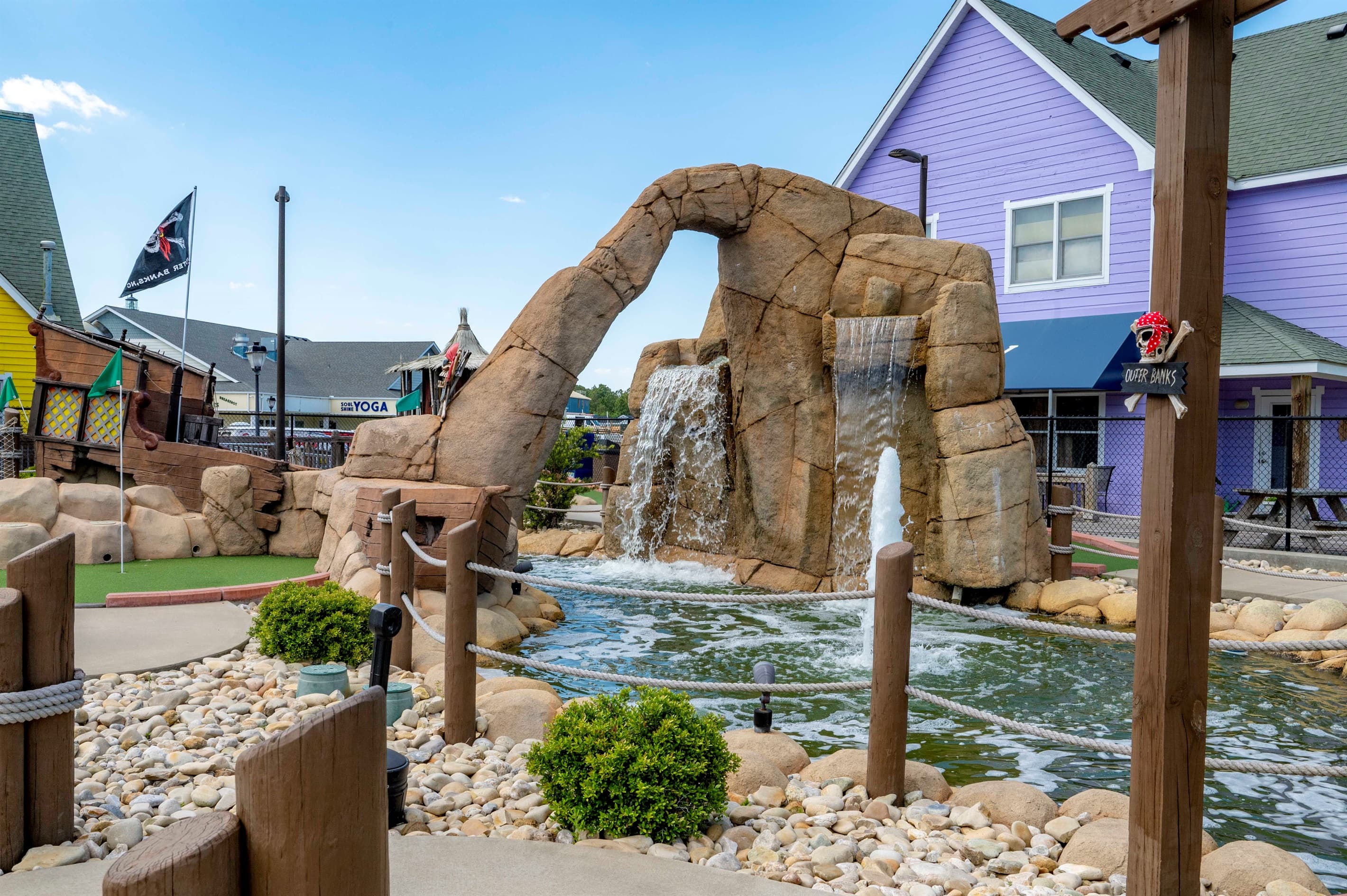 Driftwood art installation on the beach — creative coastal touches embodying the artistic spirit of the Outer Banks