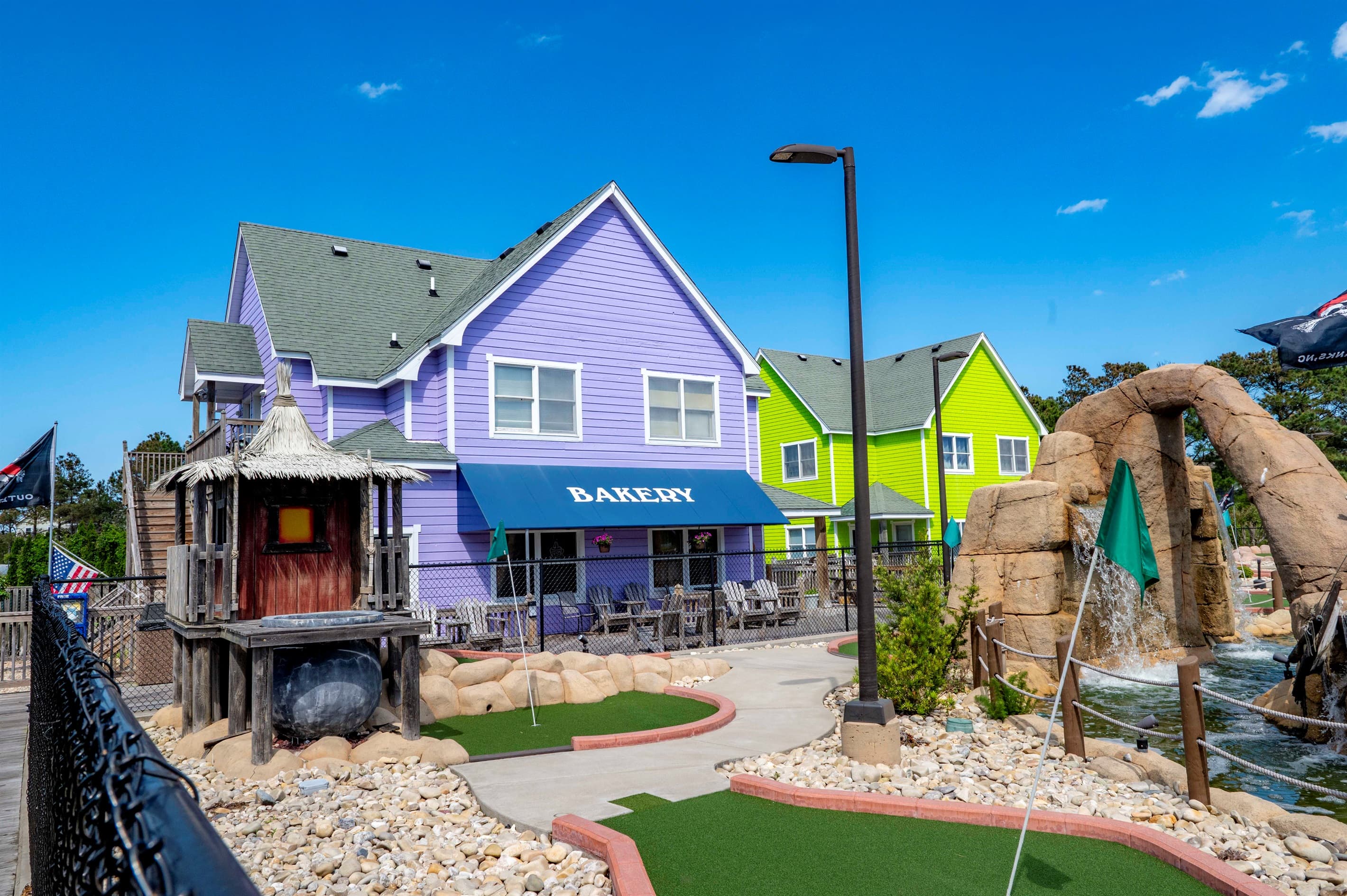 Charming retail village — unique shopping destinations with colorful facades and coastal character