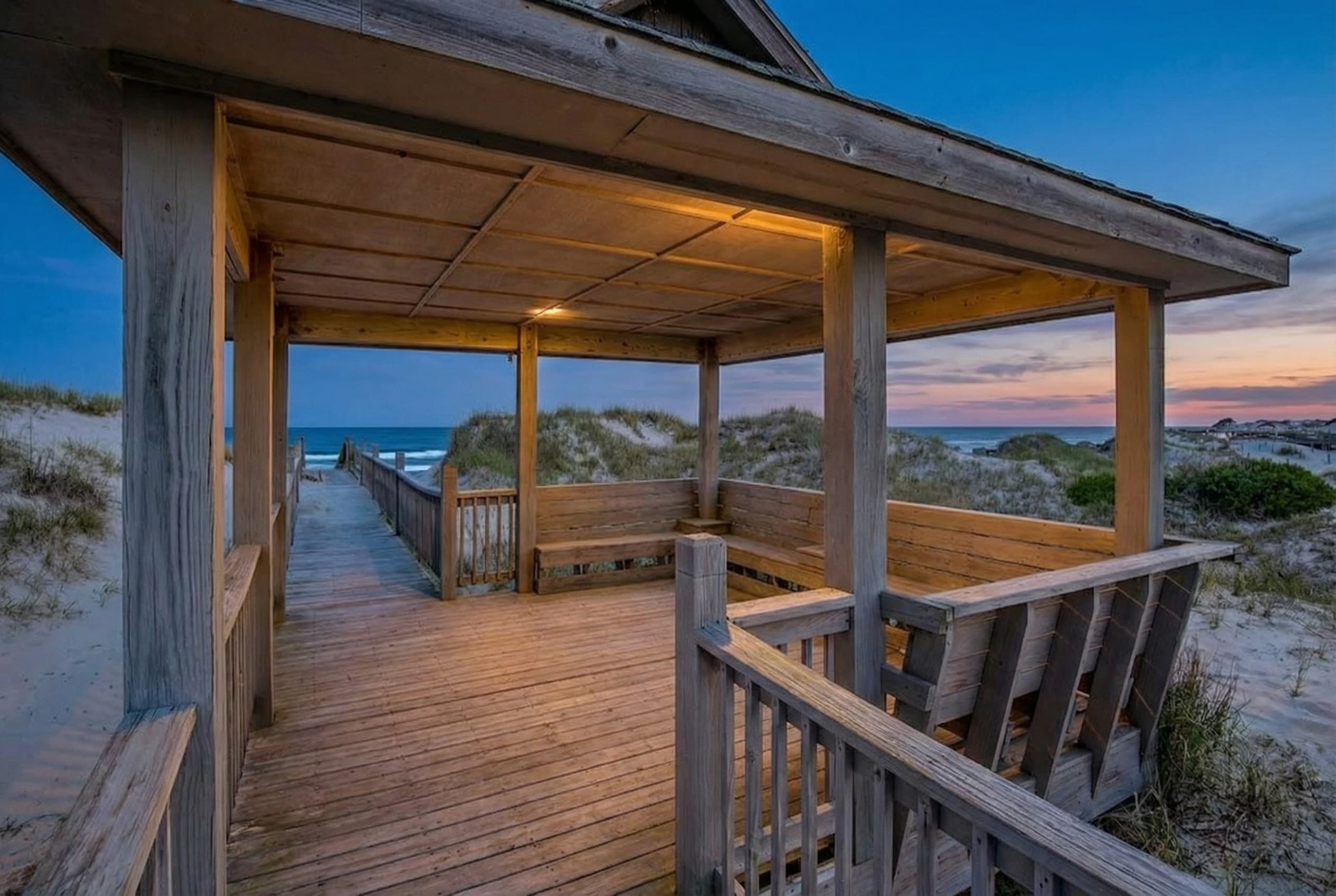 Covered Oceanfront Deck at Sunset — Al Fresco Dining & Outdoor Seating with Atlantic Ocean Views | The Mark Twain Estate, Outer Banks
