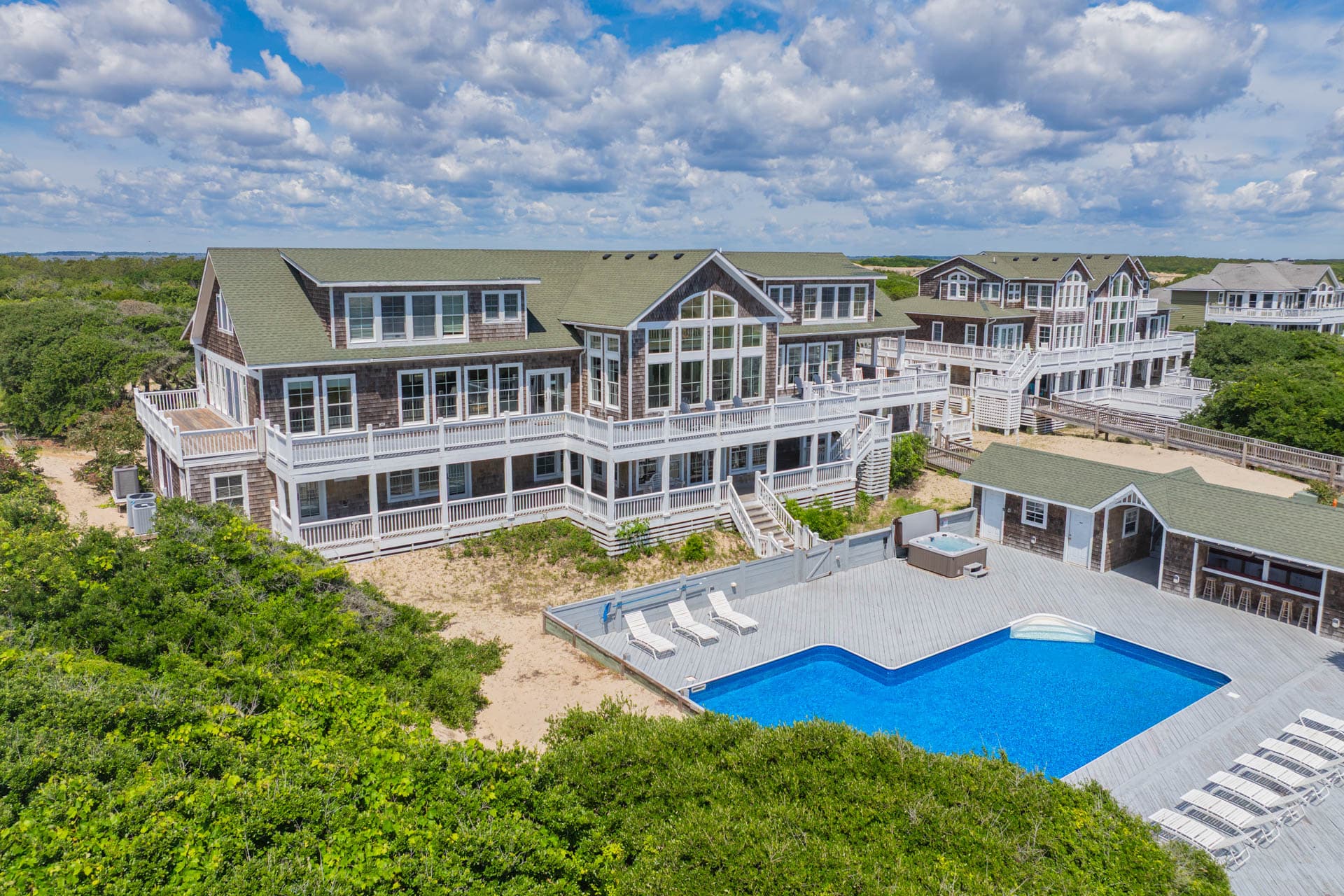 Aerial Overhead of The Mark Twain's Pool & Property — Surrounded by Pristine Dunes & Atlantic Shoreline | Corolla, Outer Banks