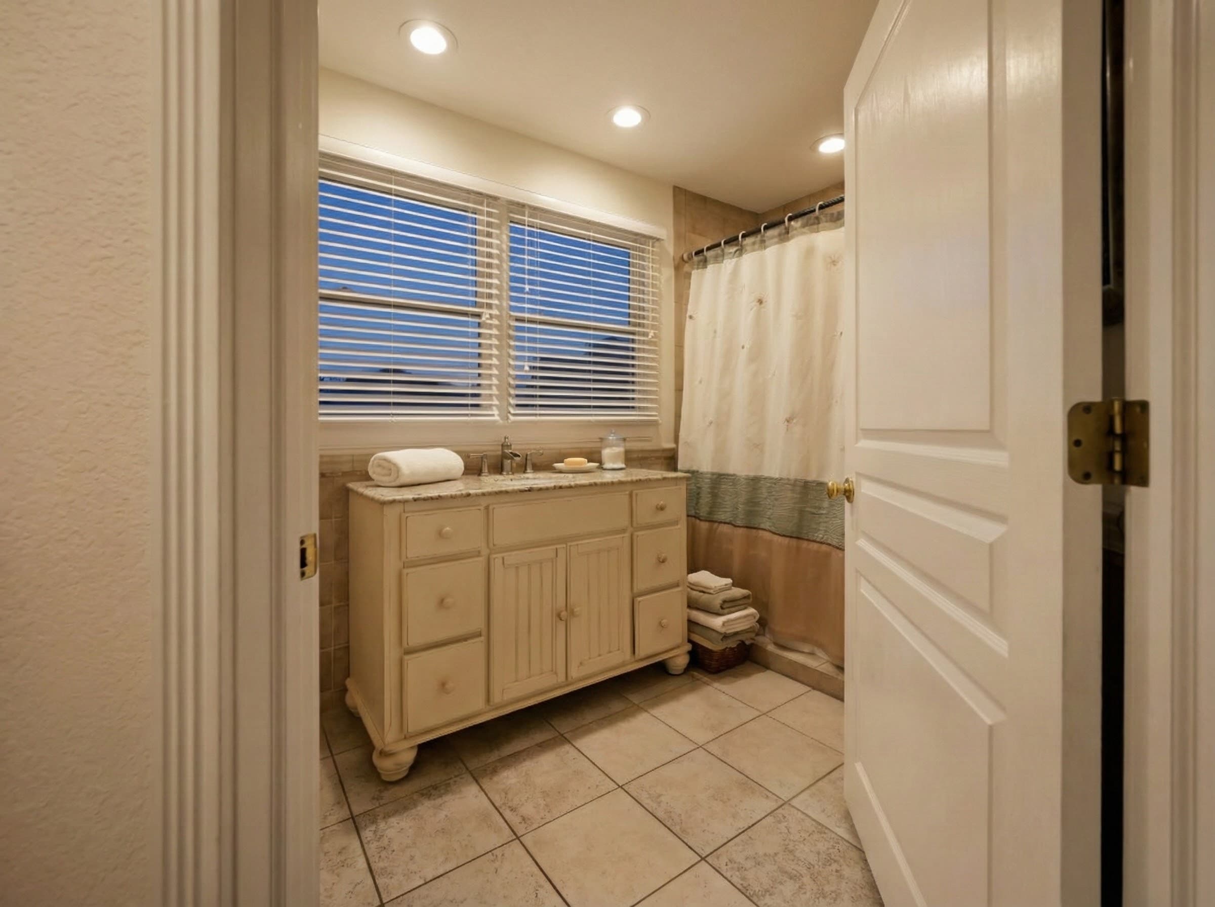 Ensuite Bathroom with Modern Fixtures — Every Bedroom Features Private or Shared Bath | The Hemingway Estate, Outer Banks