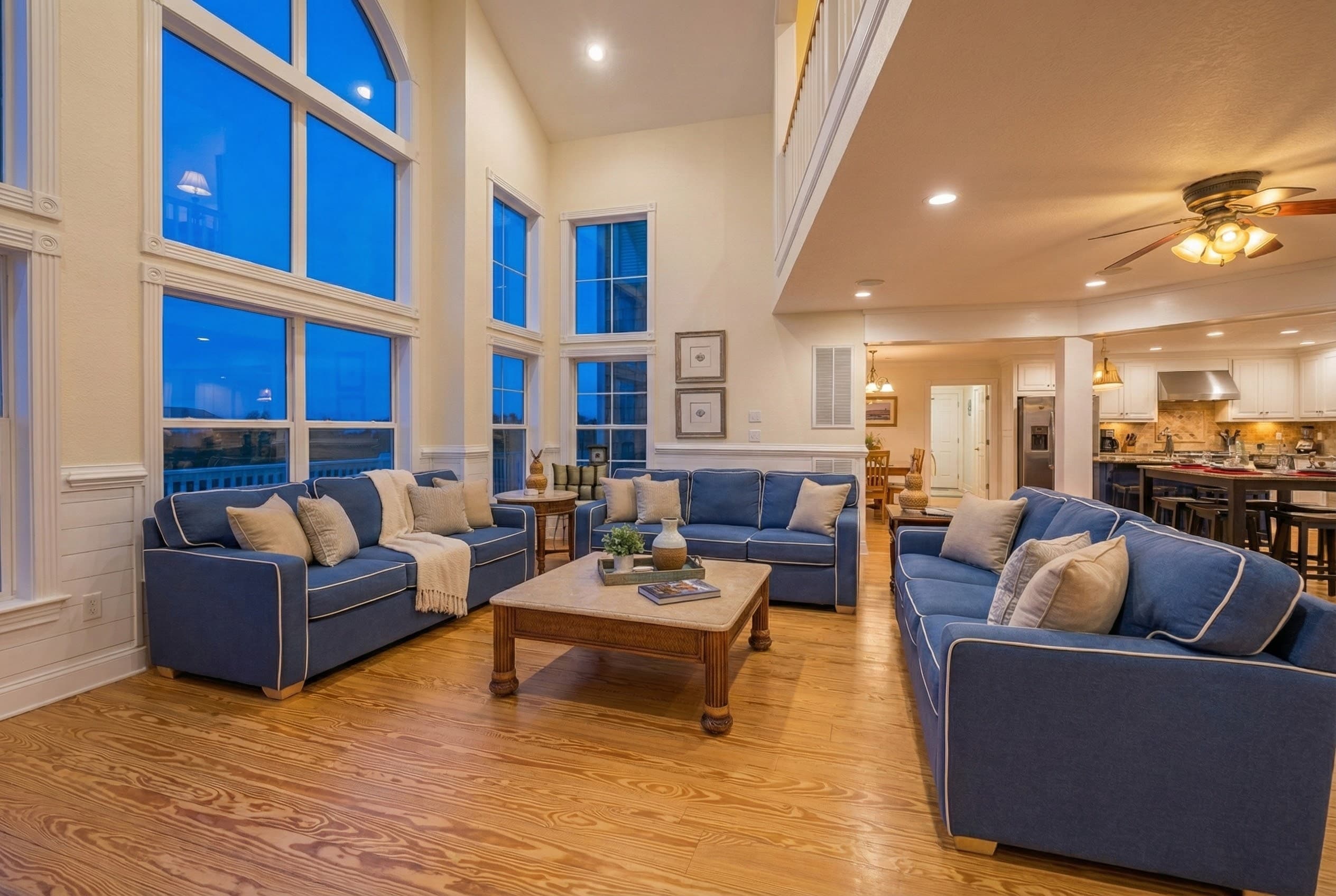 Open-Concept Great Room with Multiple Seating Areas — Vaulted Ceilings, Ocean Views & Warm Coastal Design | The Hemingway Main Gathering Space