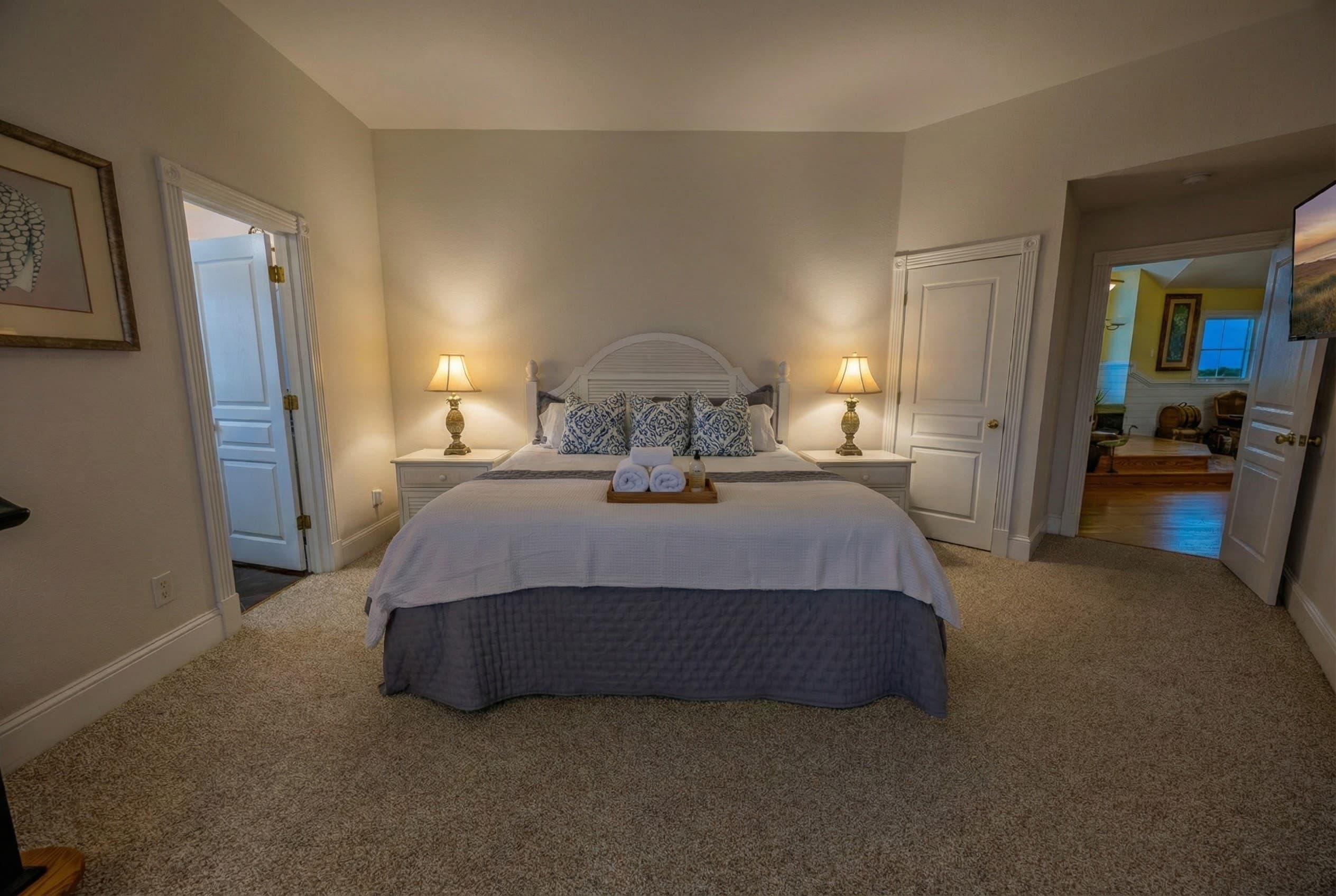 Bedroom 3 — Cozy King Bedroom with Ceiling Fan & Plantation Shutters | Sleeps 32 Guests in 14 Bedrooms at The Hemingway, Outer Banks