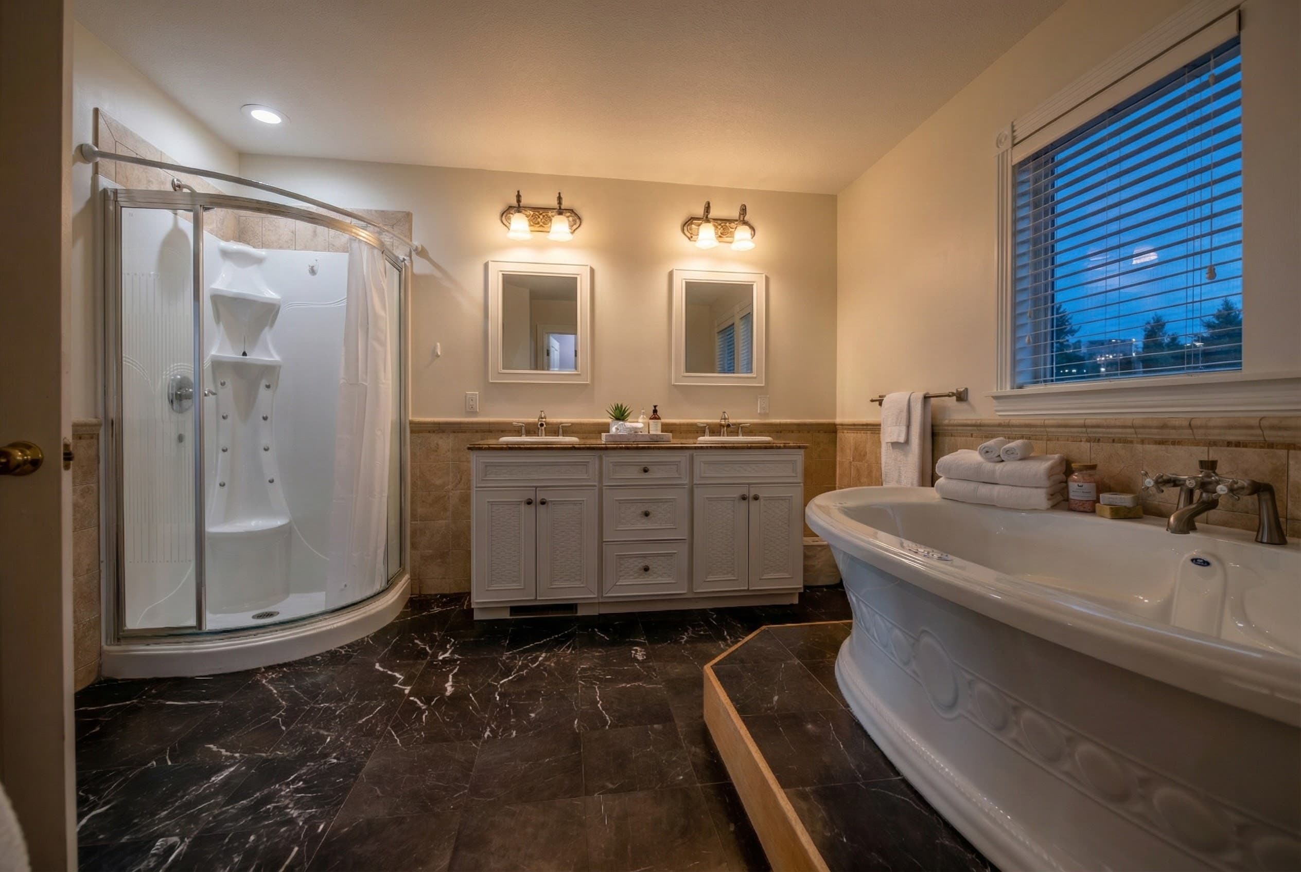 Spa-Inspired Bathroom with Luxury Fixtures & Elegant Tile — 15 Bathrooms in The Estate | The Hemingway Oceanfront, Outer Banks
