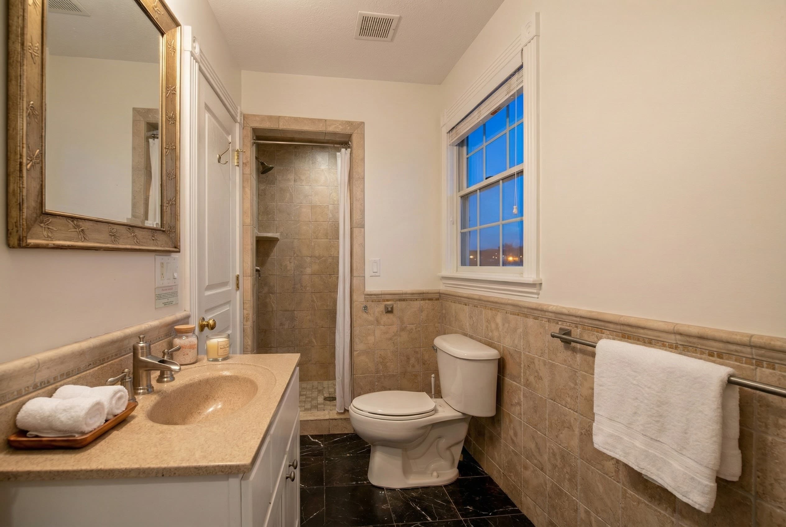 Exquisite Designer Bathroom with Dual Vanity & Walk-In Shower — Luxury Finishes Throughout | The Hemingway 15-Bath Estate, Outer Banks