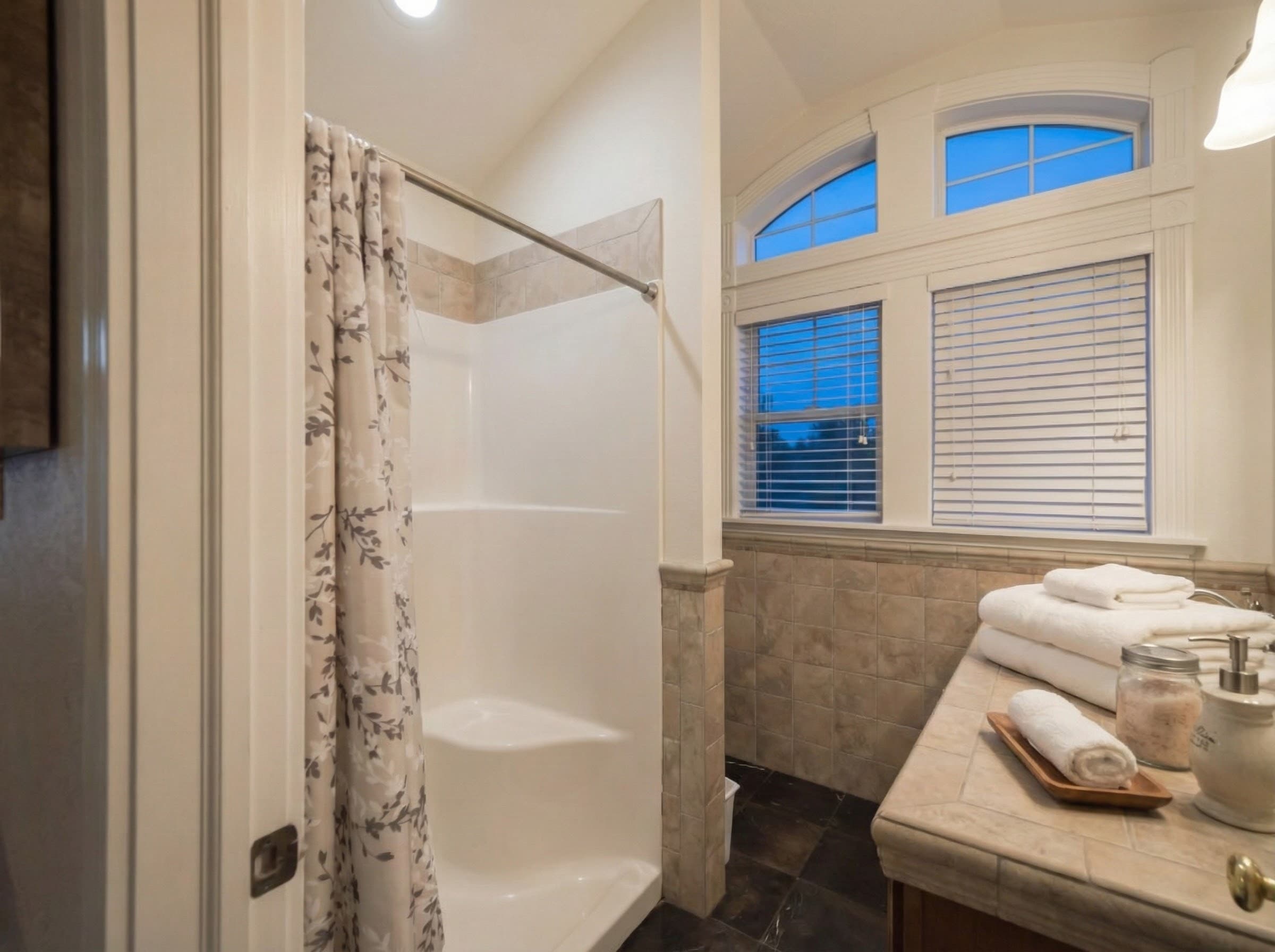 Spacious Walk-In Closet & Ensuite Bathroom — Ample Storage for Extended Stays | The Hemingway Luxury Accommodations, Outer Banks