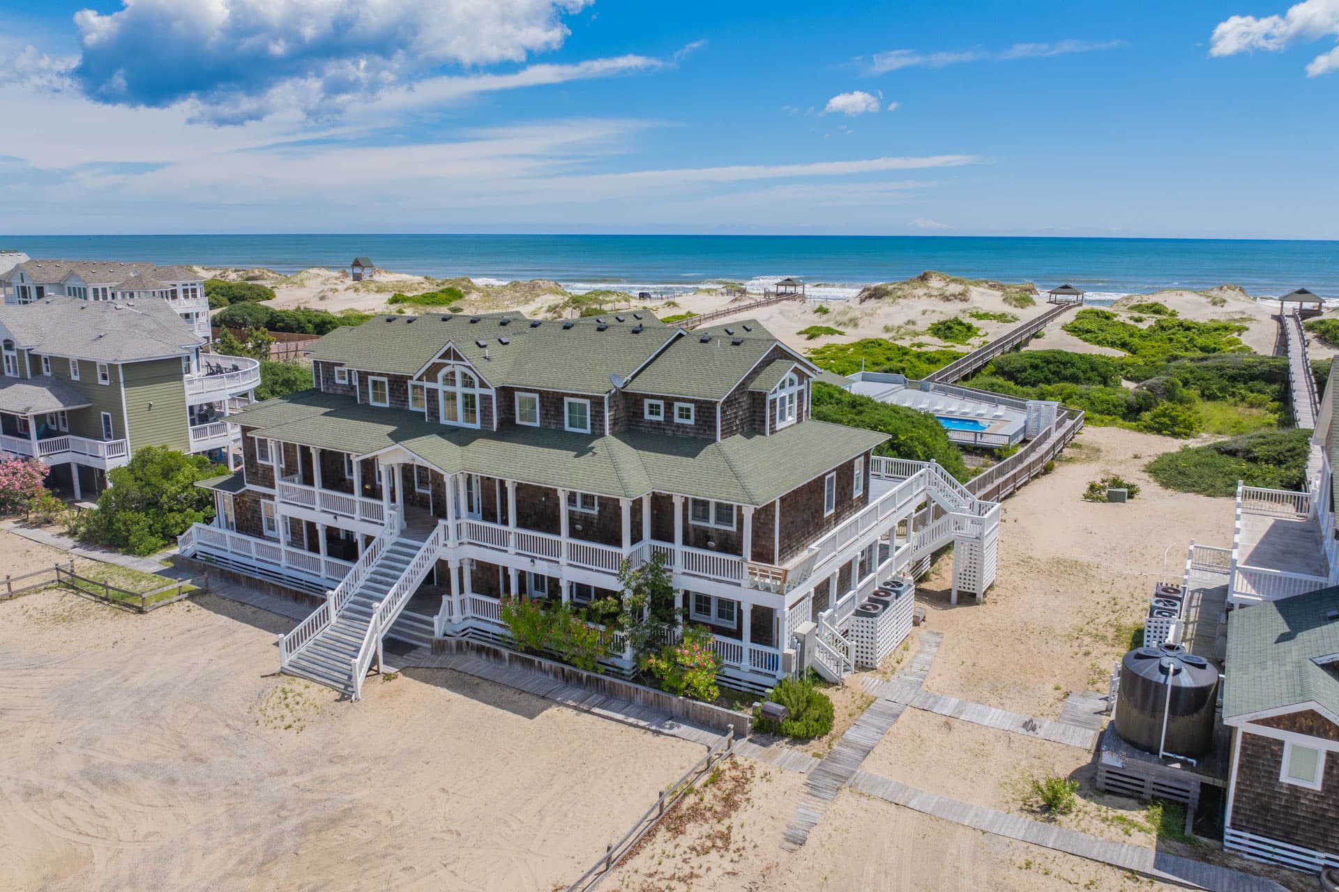 Stunning Aerial of Corolla's Pristine Oceanfront — The Hemingway's Private Beachfront | Direct Beach Access, Outer Banks