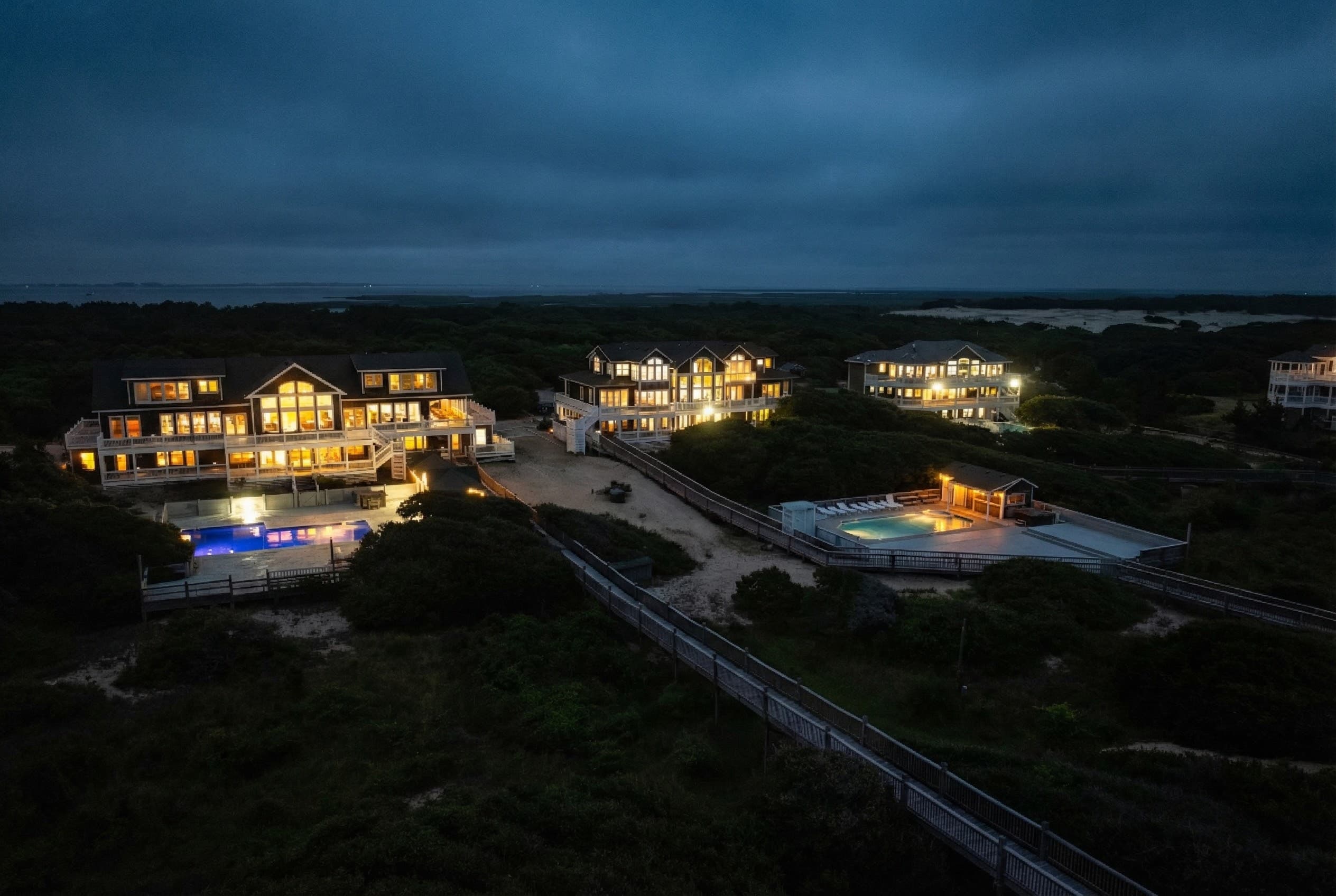 Private Estate — Aerial View of Three Authors, 46 Bedrooms Across 11 Oceanfront Acres | OBX Venue