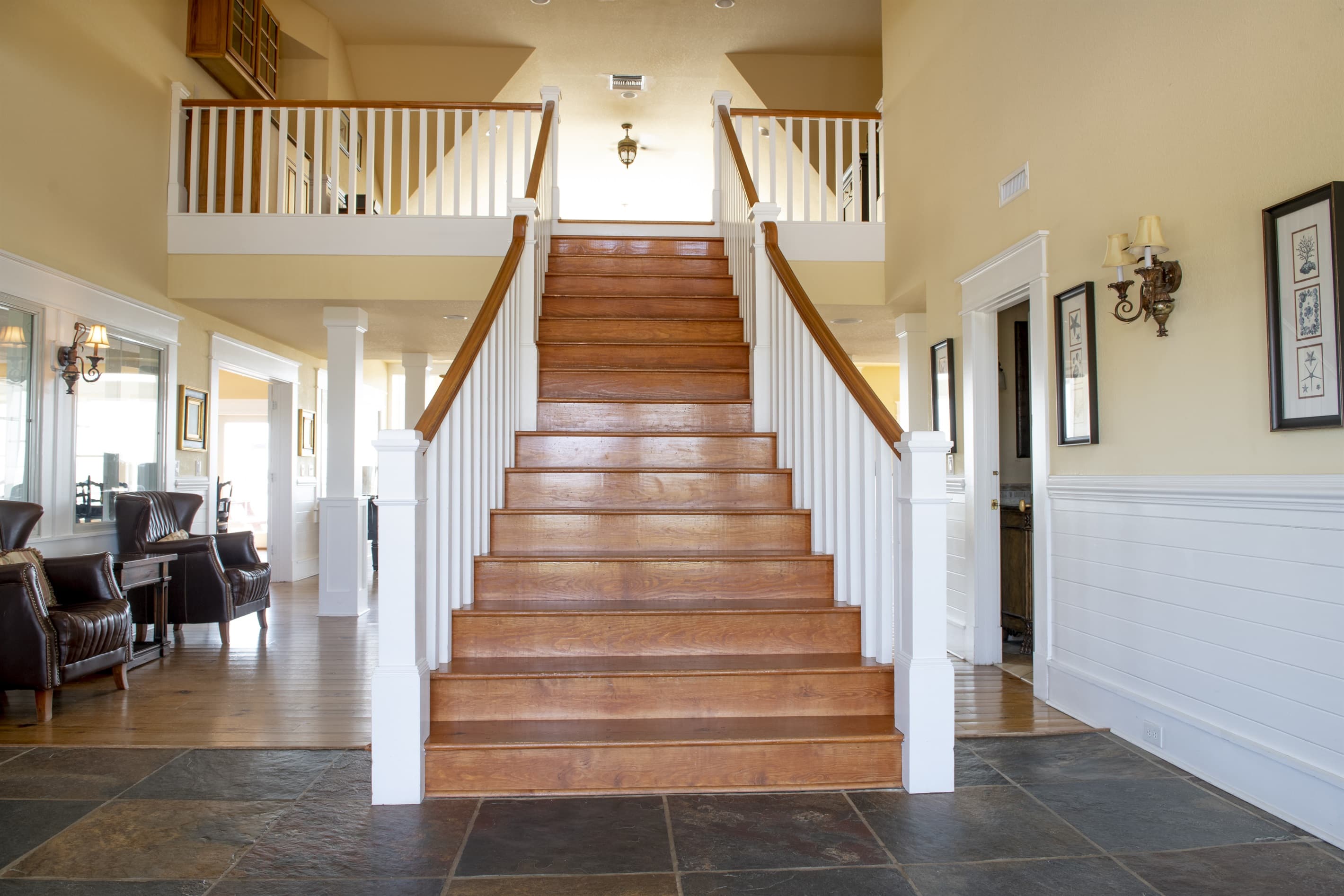 Private Estate Interior — Grand Staircase & Elegant Entry at The Fitzgerald, Coastal Luxury Design Throughout | Elevator Access in All Three Homes