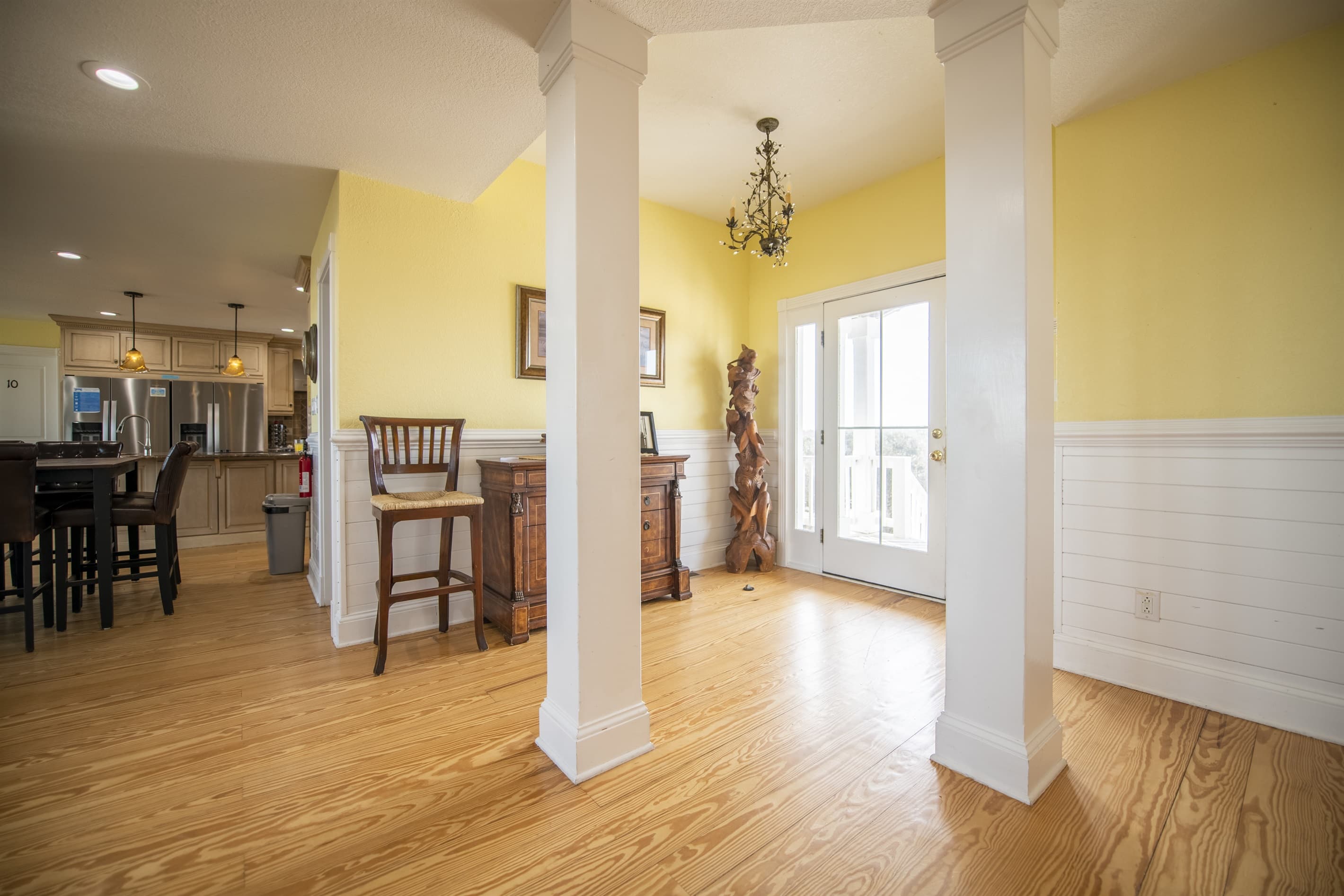 Exclusive Estate Entrance — The Hemingway Main Floor Welcome with Classic Coastal Design | Three Authors, OBX