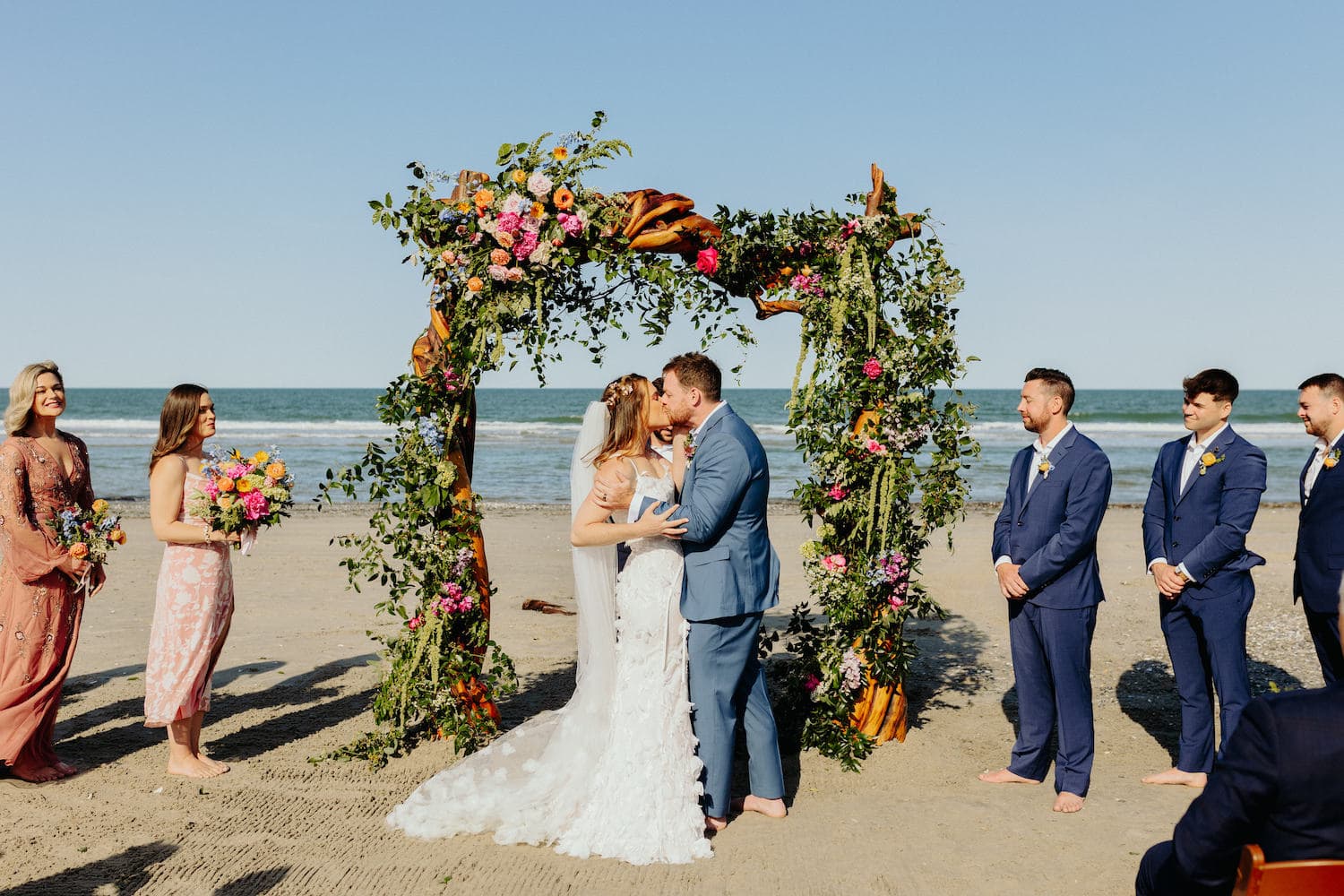 Wedding Reception — Elegant Dining Under Festive Lighting by the Ocean | Three Authors Estate, OBX