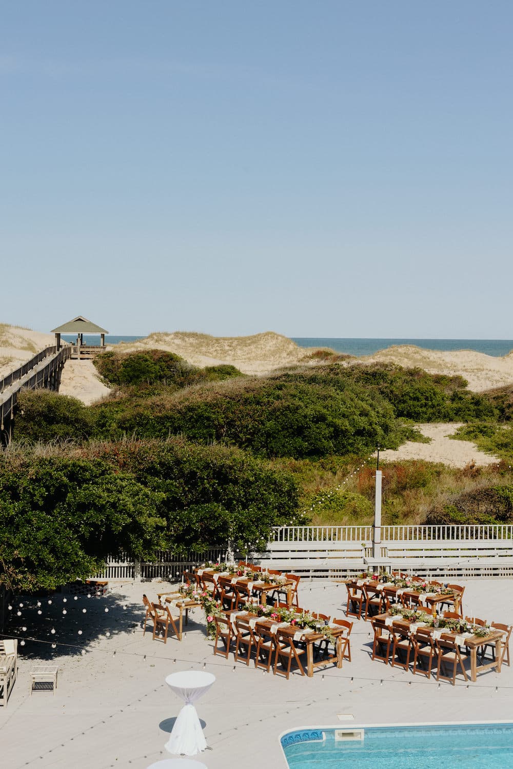 Ceremony Space — Romantic Oceanfront Aisle with Floral Accents & Atlantic Views | Three Authors, OBX