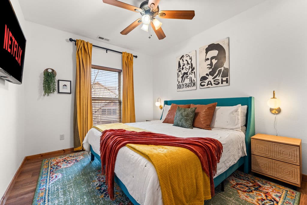 Kick back in the Dolly & Cash room — a king bed tribute to a Country legend, just off the game room