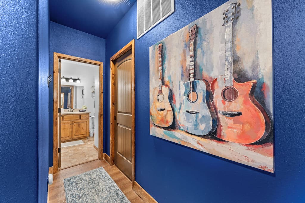 The downstairs bathroom sits right next to the laundry room with a full-size washer and dryer