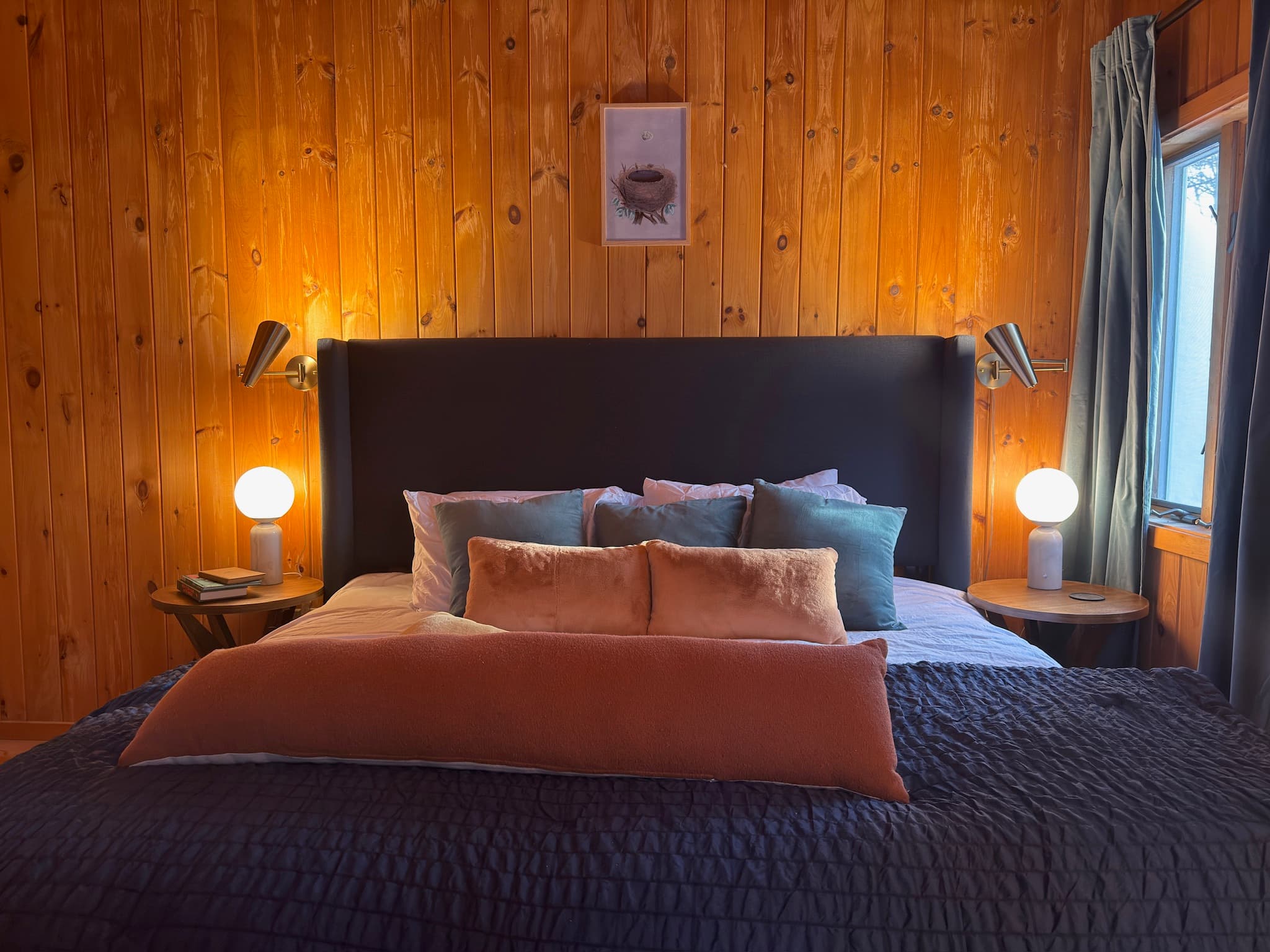 Soft warm light in the main bedroom