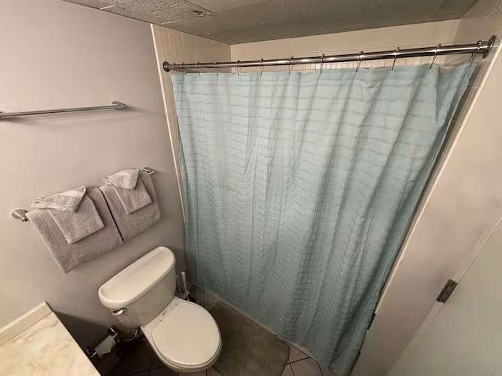Bathroom with shower and bathtub