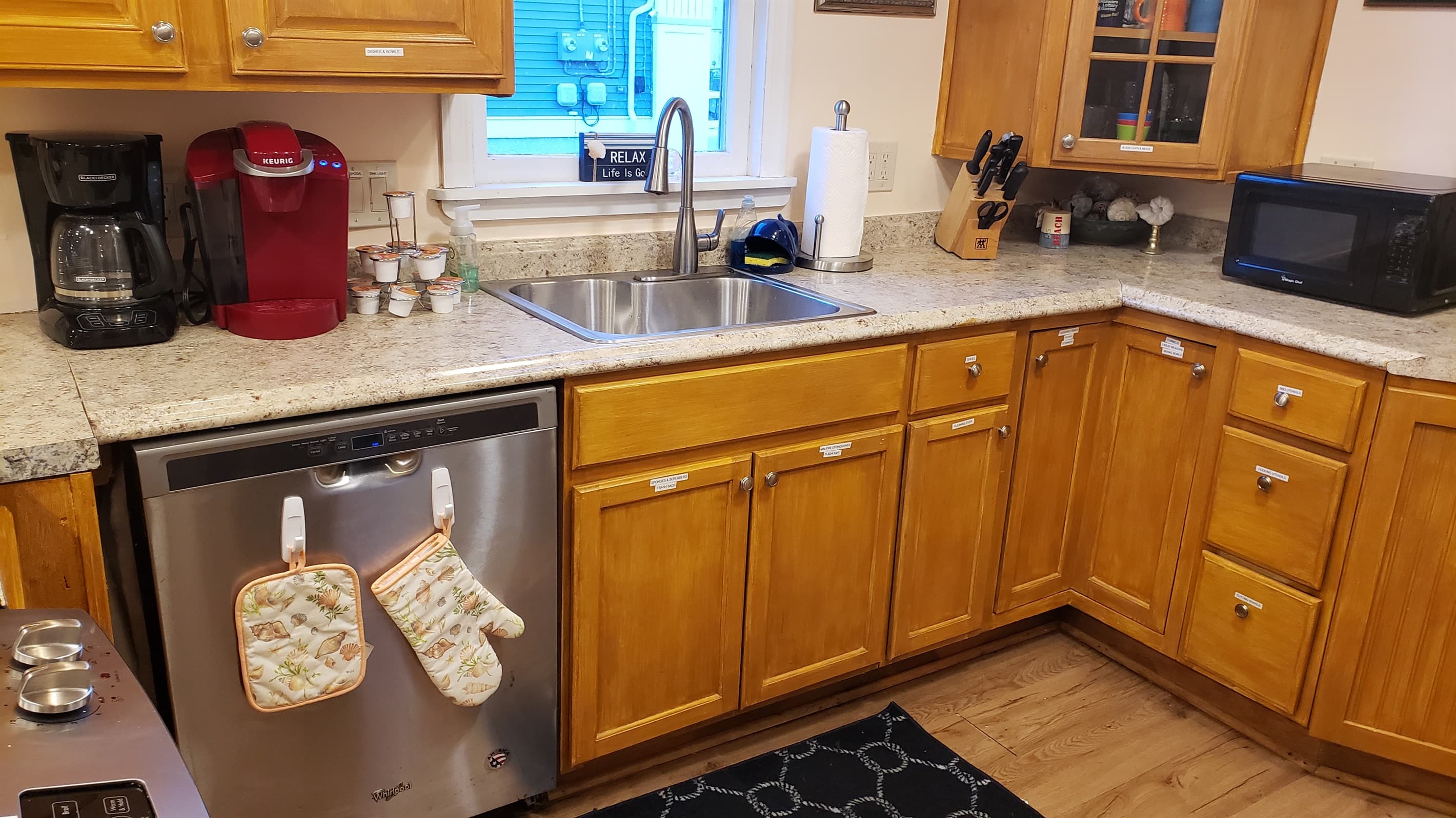 1st Floor: Fully functional kitchen with coffee & keurig, large sink.