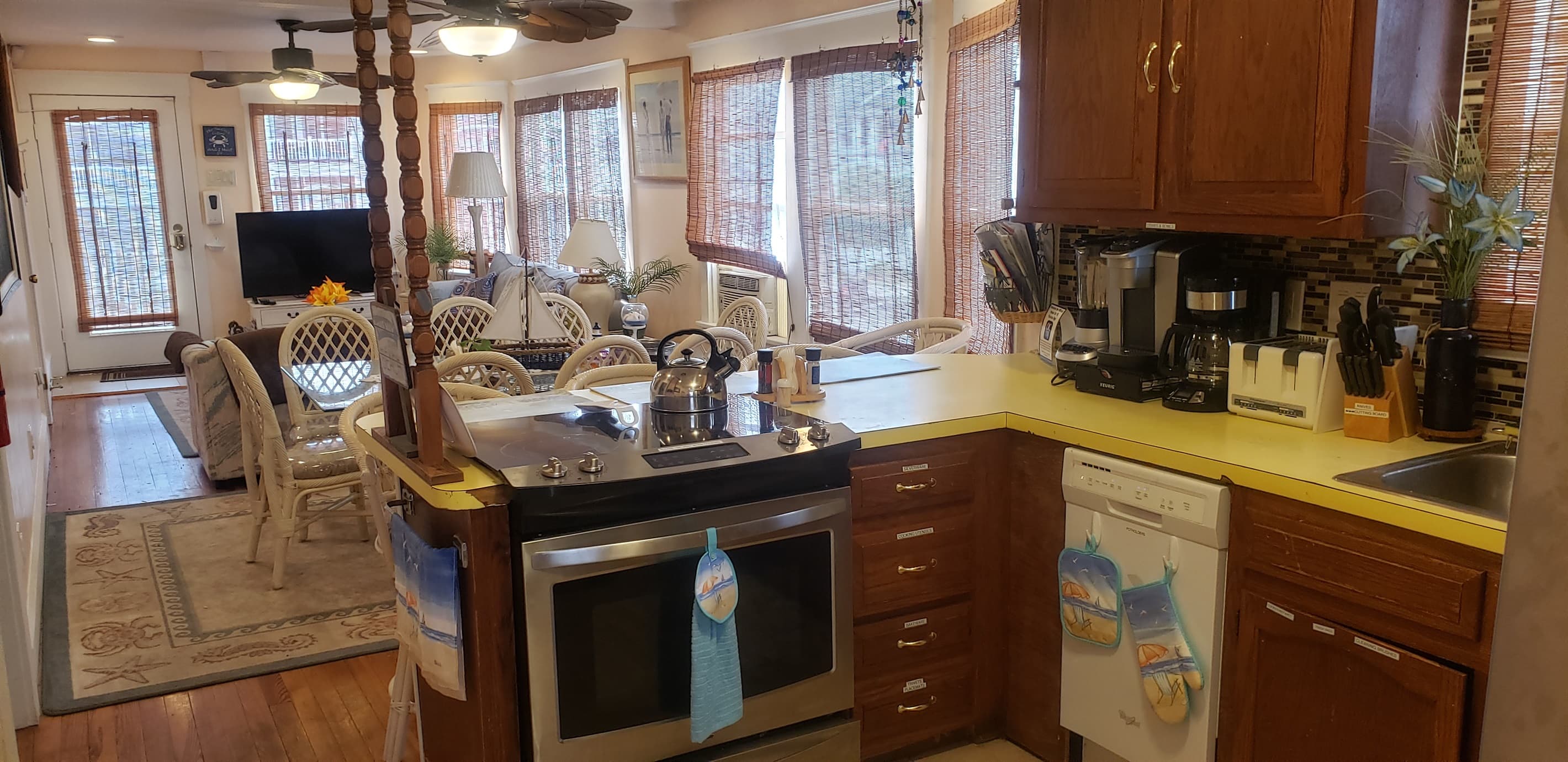 2nd Floor Long Shot from the Kitchen. Electric flat top stove with wifi capabilities and child safe knob protectors.
