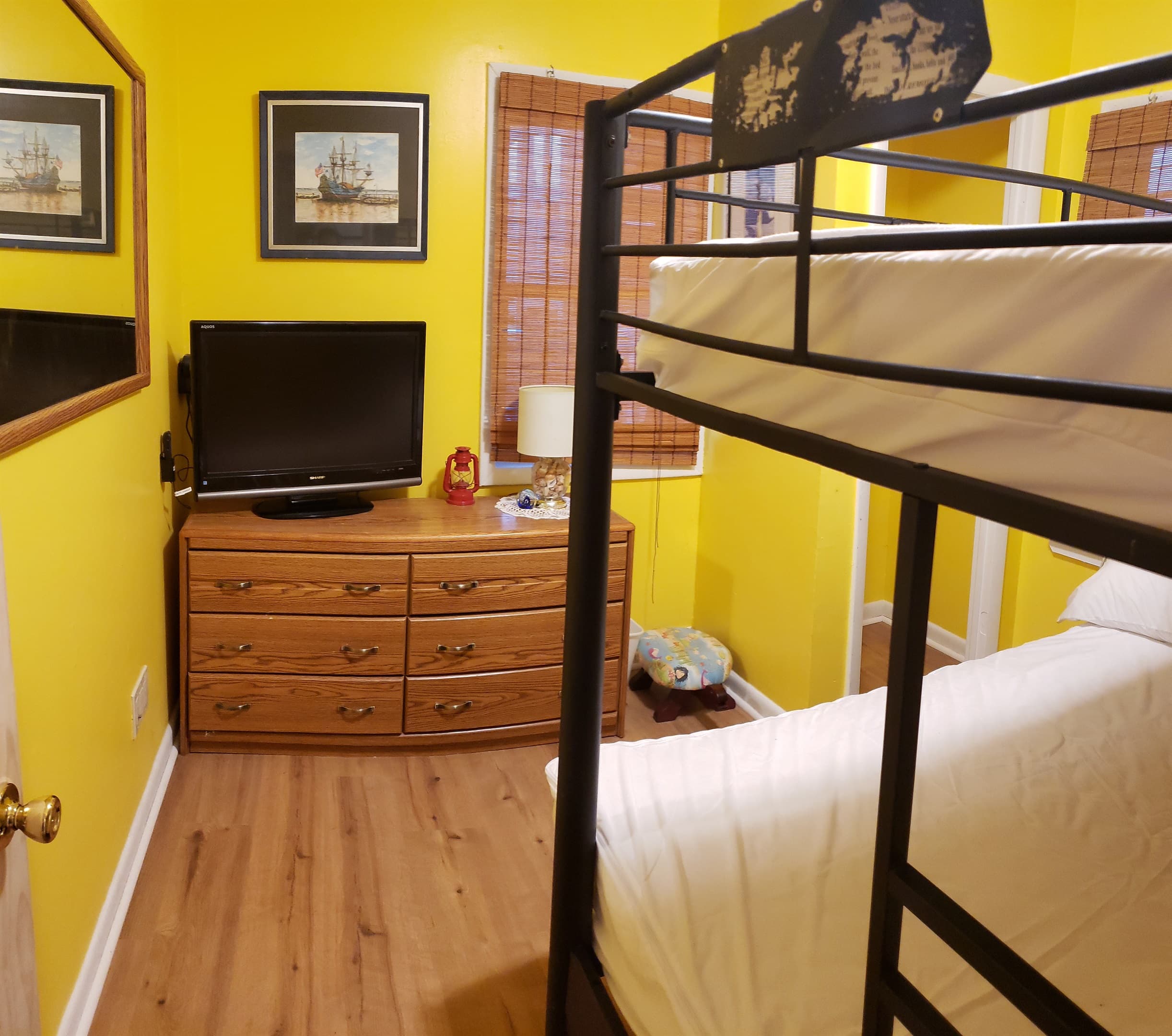 1st Floor: Yellow bedroom good for kids or a family of 3