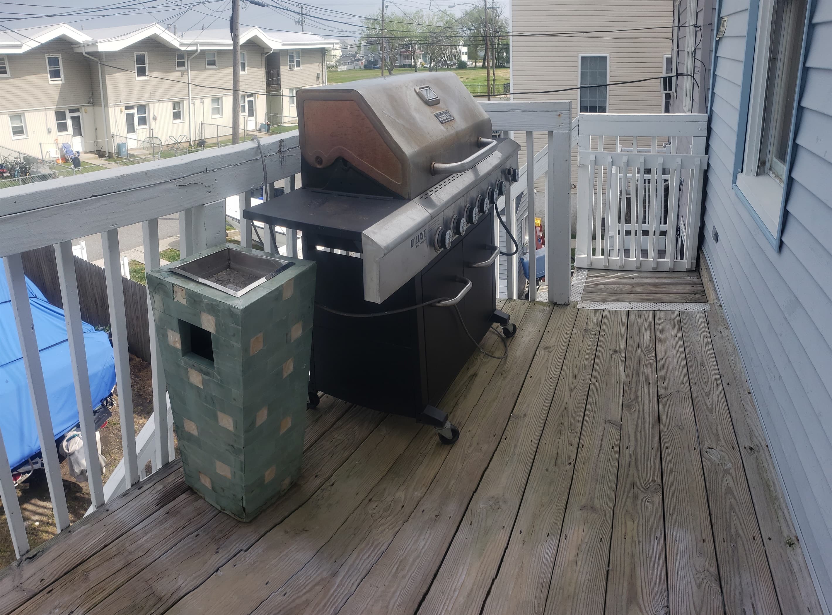 2nd Floor: Gas grill provided as well as propane. Back deck has gate