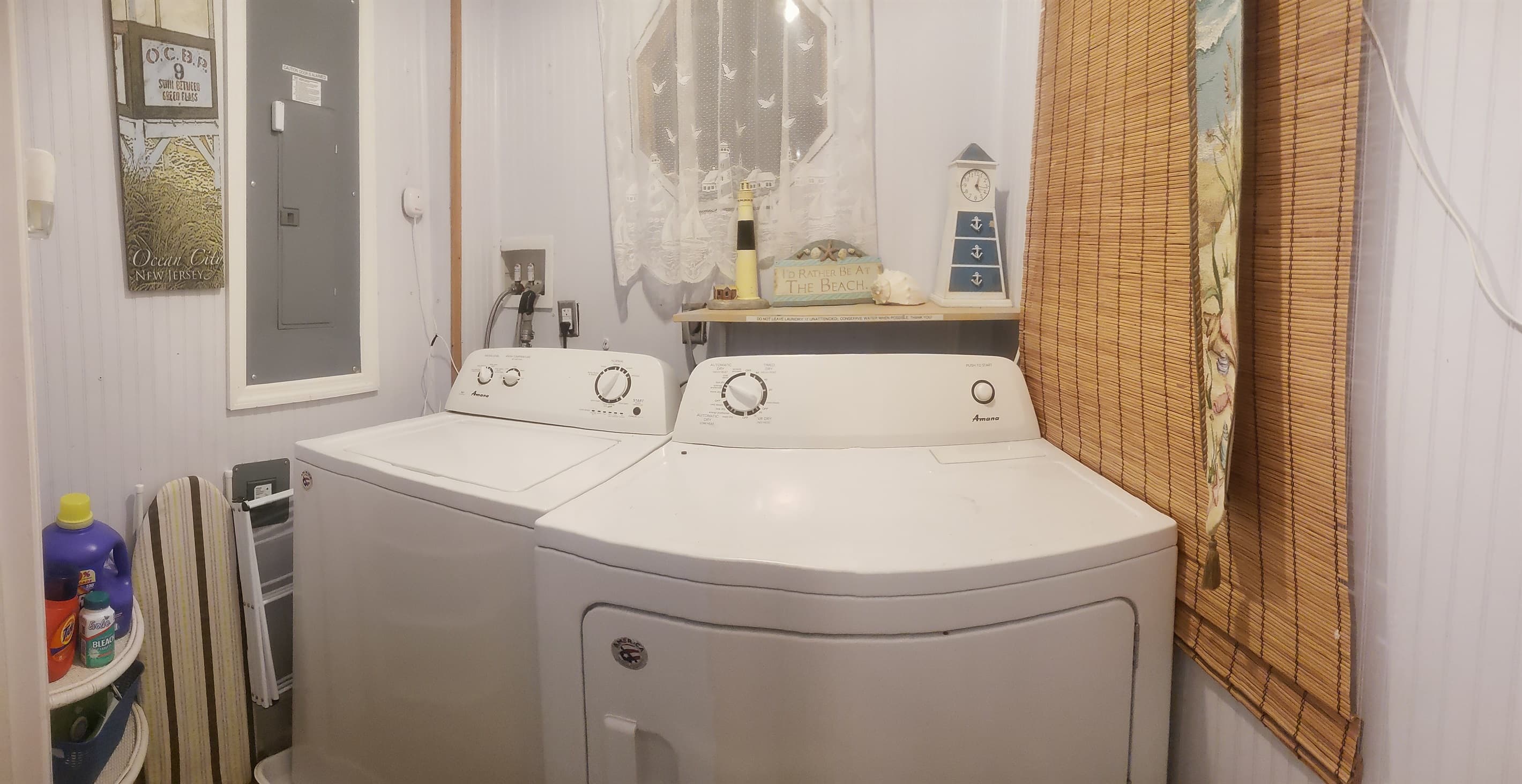 Laundry Room is on the 2nd floor bumpout contains ironing boards, irons, washer dryer, and clothing drying rack.