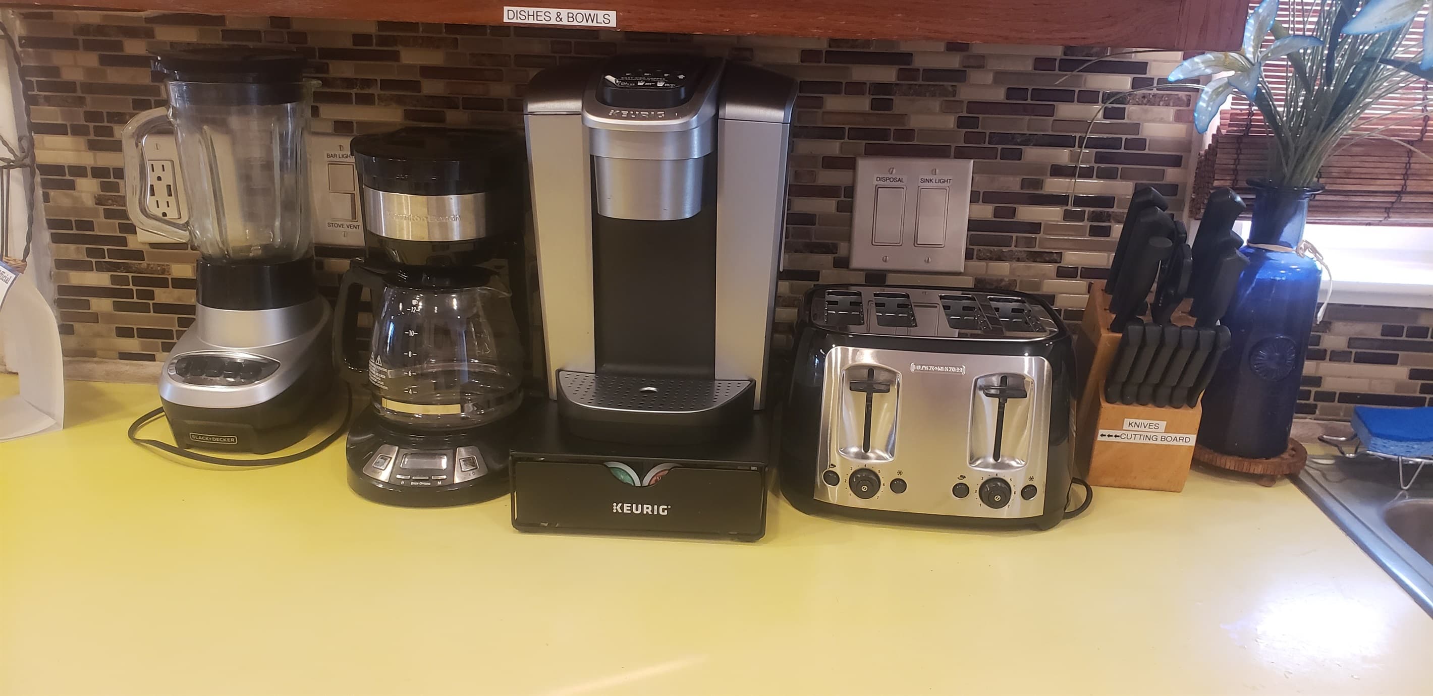Both floors have toasters, keurigs, coffee pots, knife blocks, & blenders