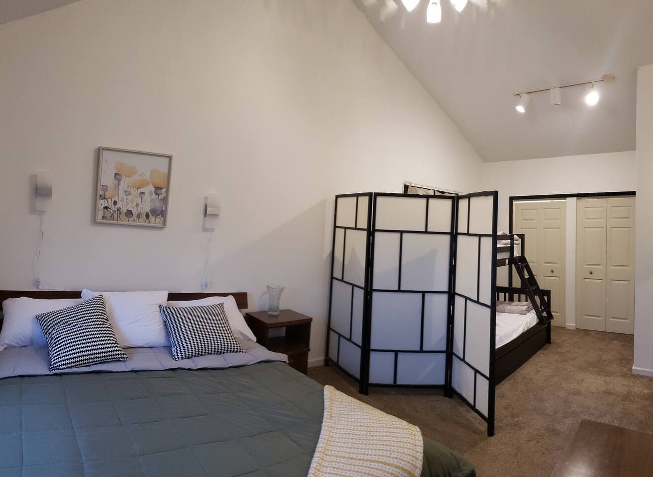 This King bed is very large and yet it seems dwarfed by the large vaulted ceiling!