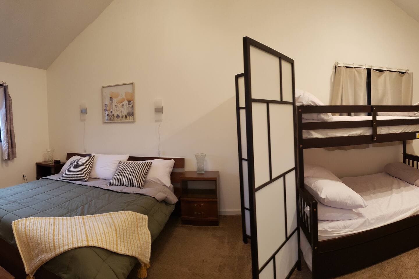 This is the Master bedroom. Perfect for sharing the room with your kids especially if you are traveling with multiple families. We set up a privacy screen so mom and dad can watch TV without disturbing the children. 