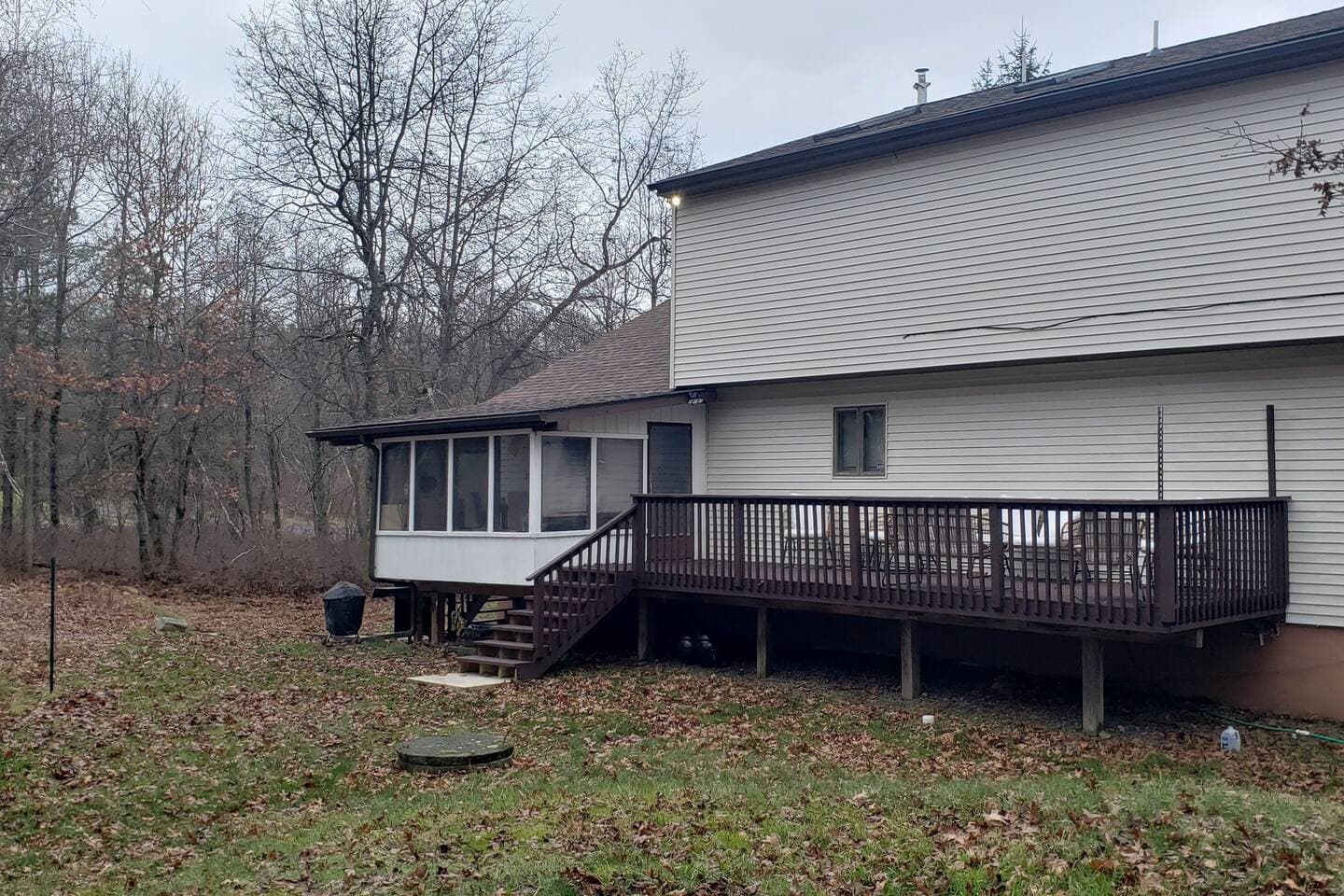 This is the back of the house. Be careful walking on the lawn as you can see it used to be gardens that have been removed causing uneven ground. The house is larger than it looks.