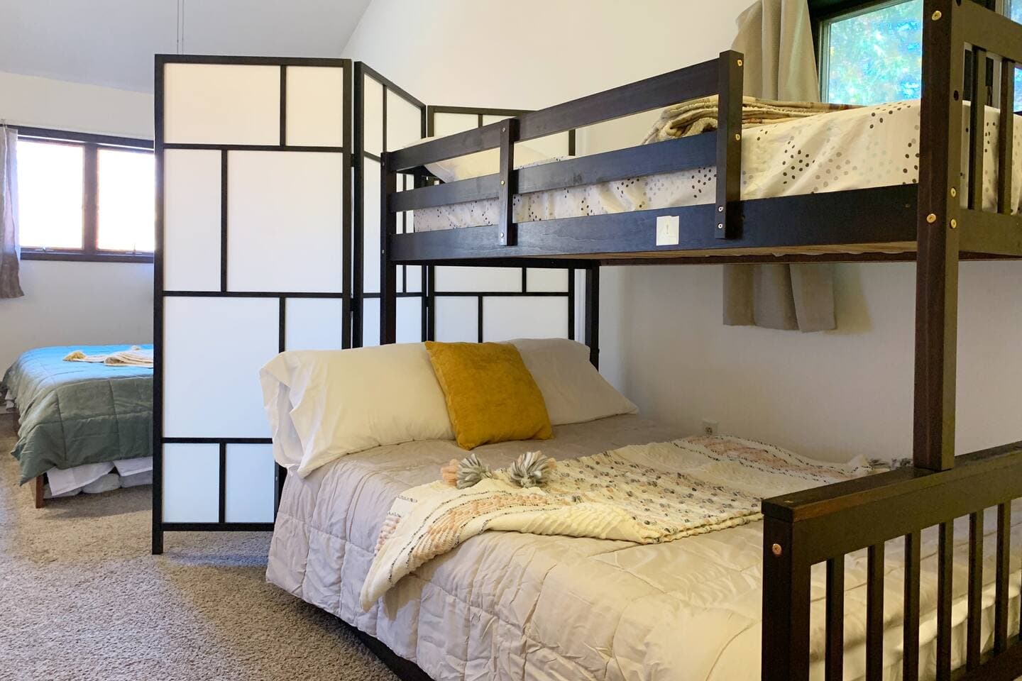 A twin over full bunk bed with twin trundle allows for up to 4 children to sleep together. Maximum weight of top bunk is 110lbs. 