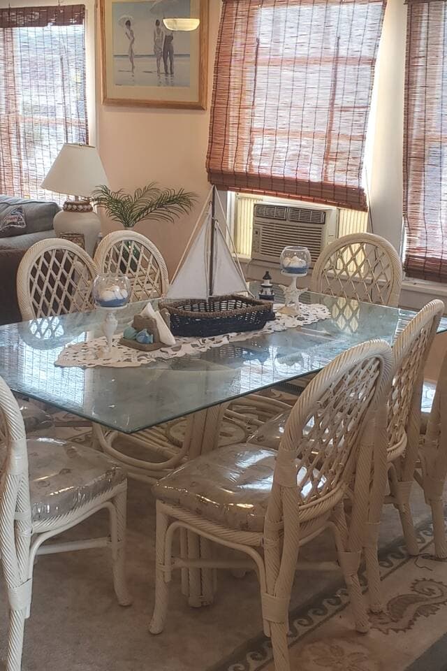 Glass dining table that seats 8 comfortably.