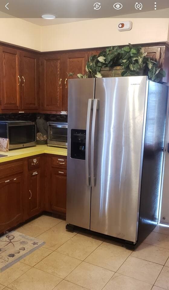 Full Fridge, large microwave, and digital convection toaster oven. 