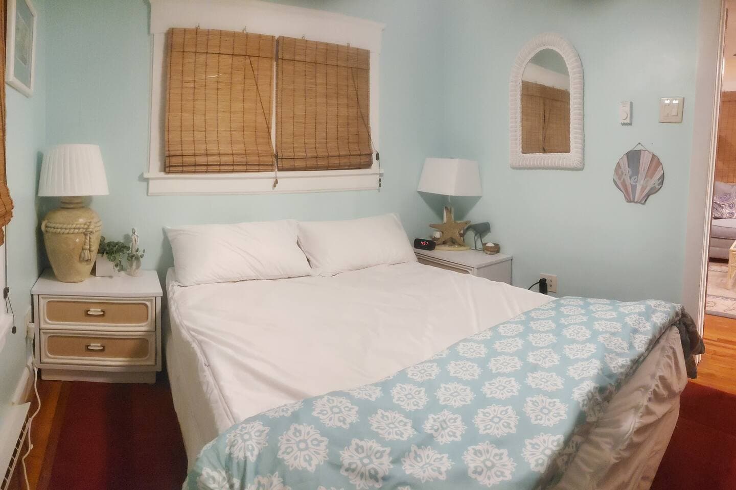 The front bedroom with queen sized plush bed. 