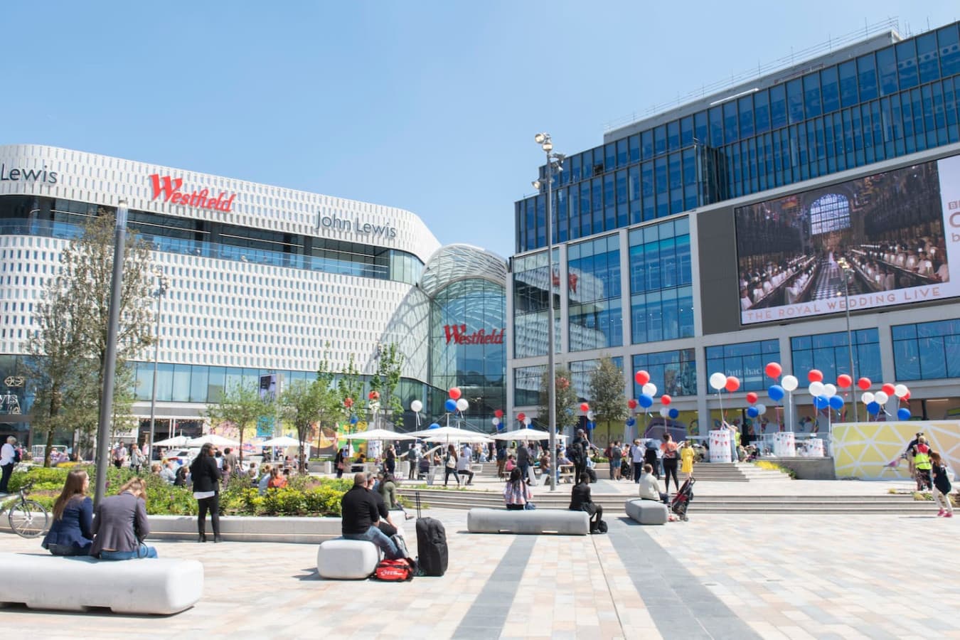 Westfield Shopping Centre offers a vibrant and immersive shopping experience with a vast array of high-end stores, diverse dining options, and a captivating atmosphere.
