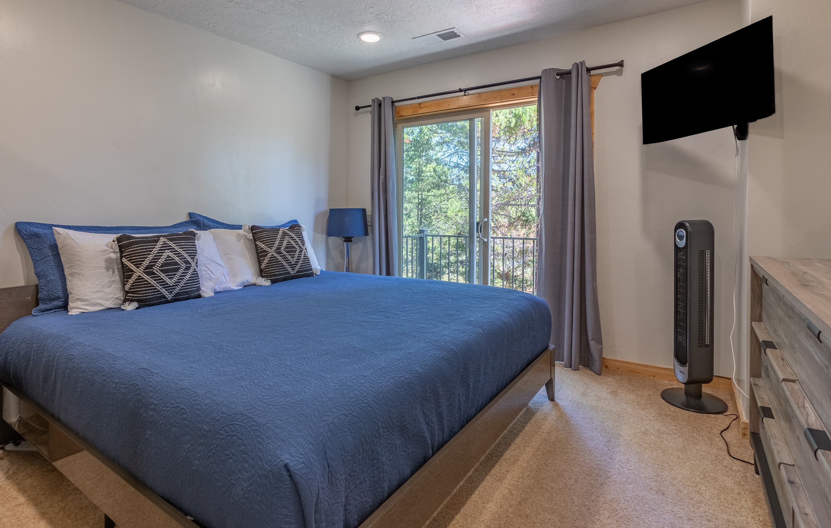 Bedroom two with king bed & TV
