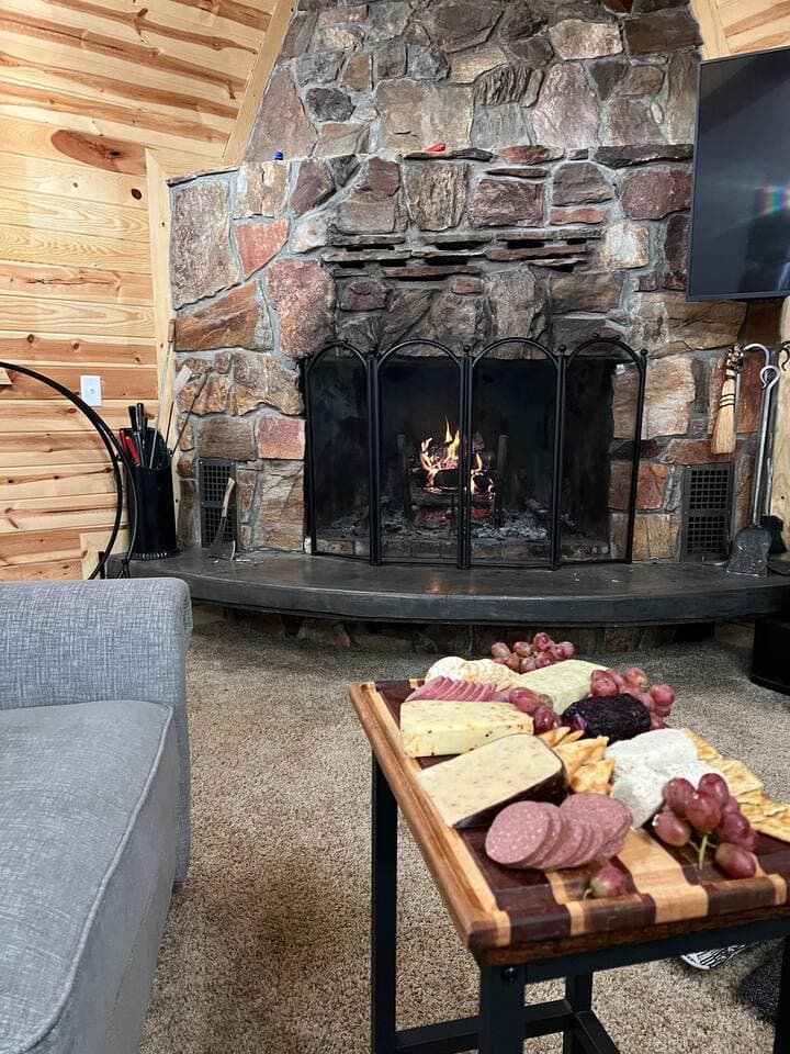 Fireplace is a great focal point in the great room. (Firewood is not provided)