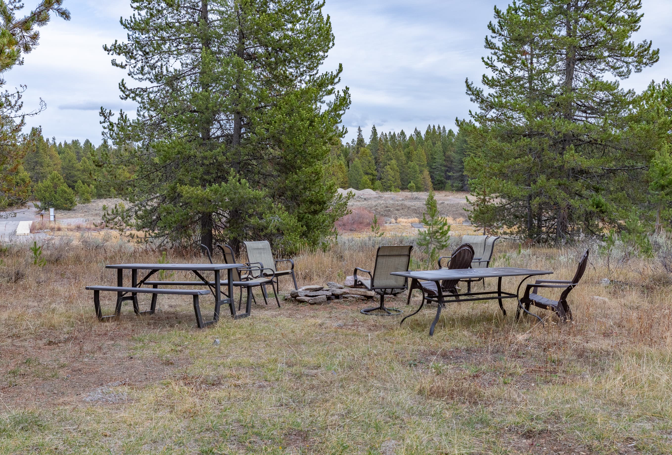 Enjoy the view of the water from the fire pit and picnic area
